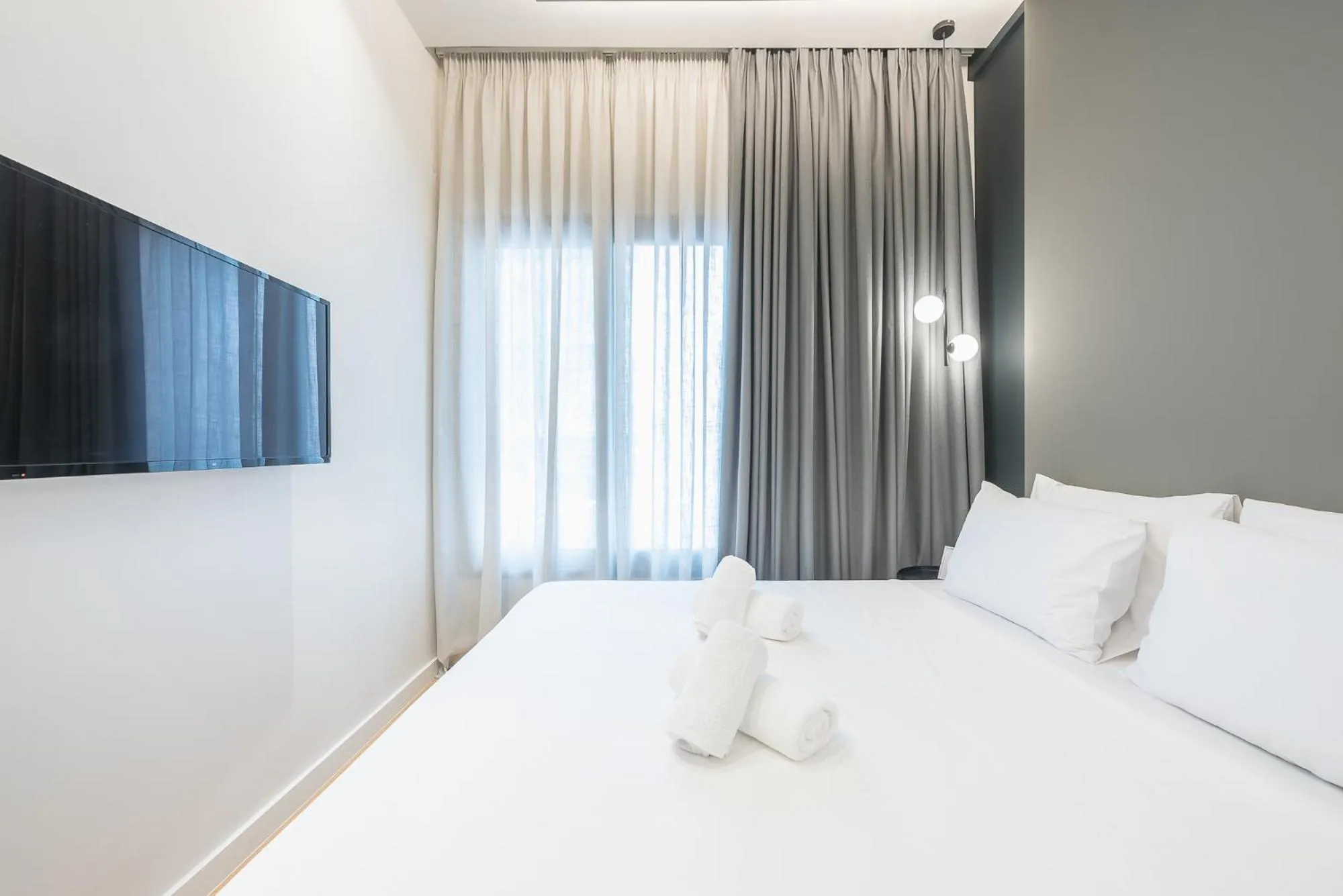 Bed in The Asprogeraka - self check-in rooms