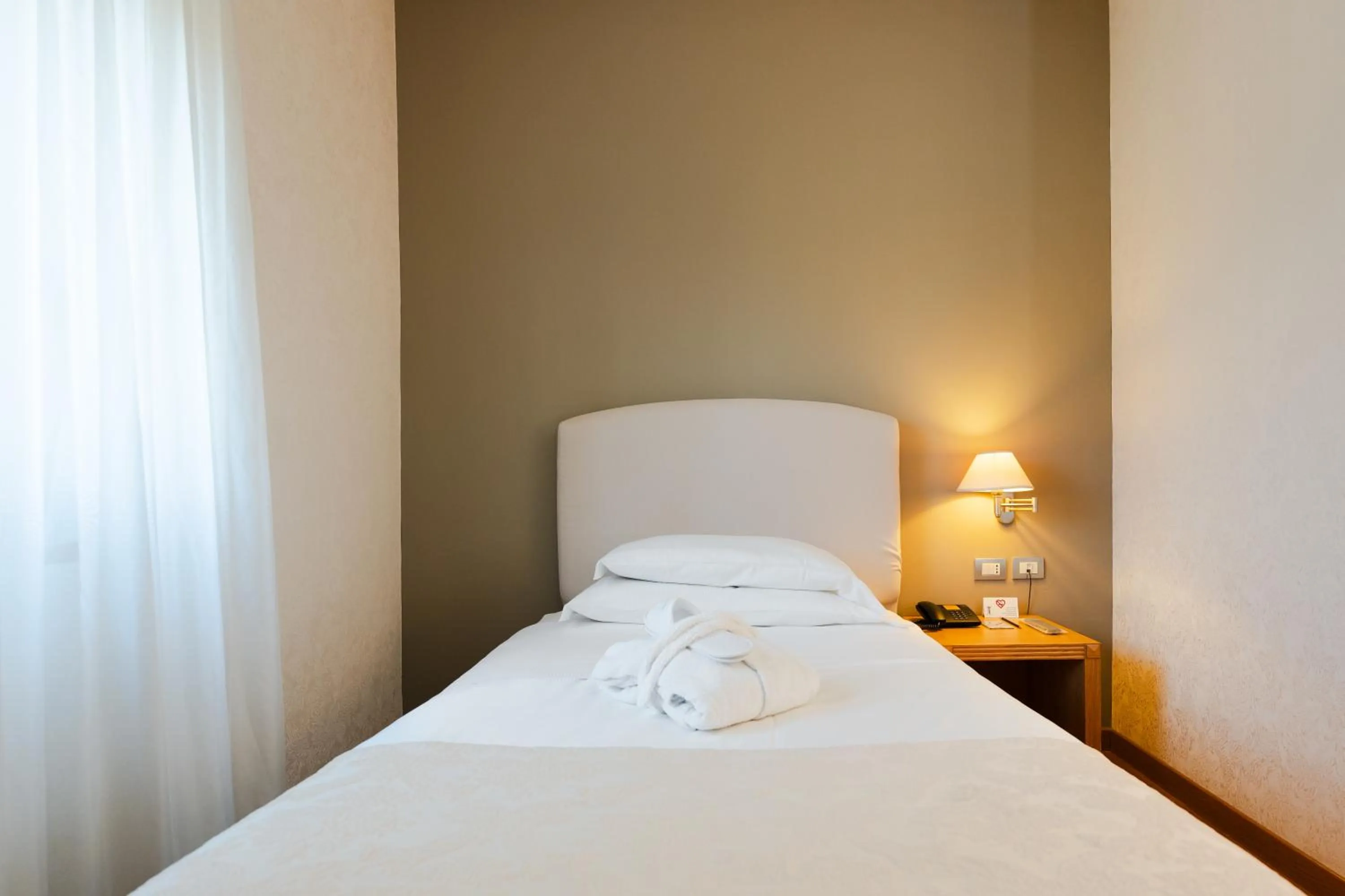 Bed in Hotel Touring