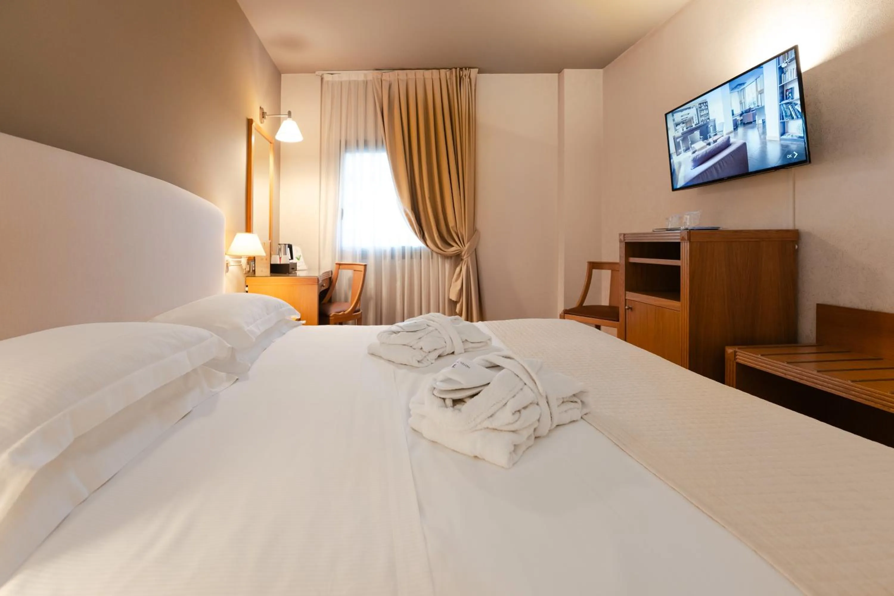 Bed in Hotel Touring