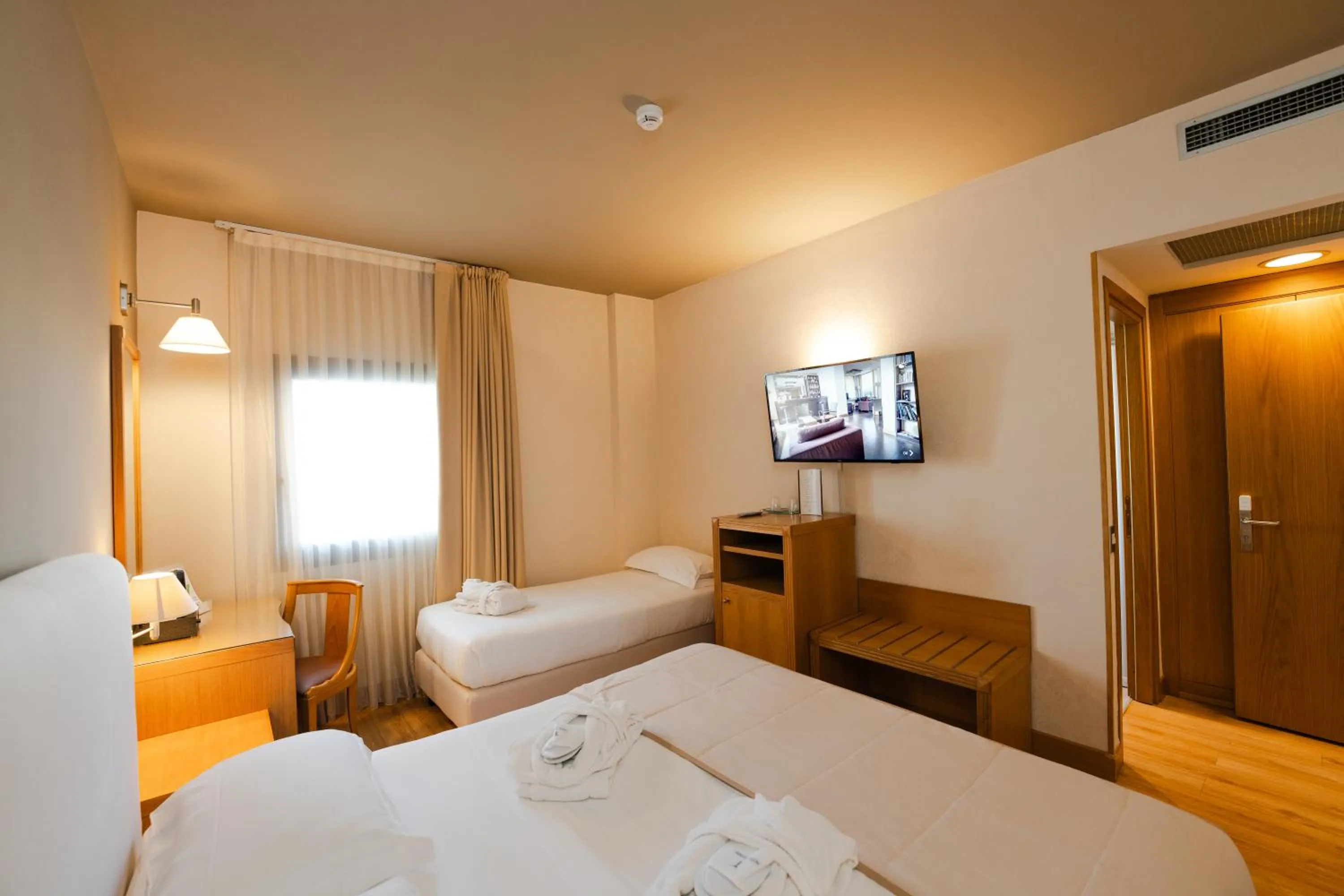 Bed in Hotel Touring