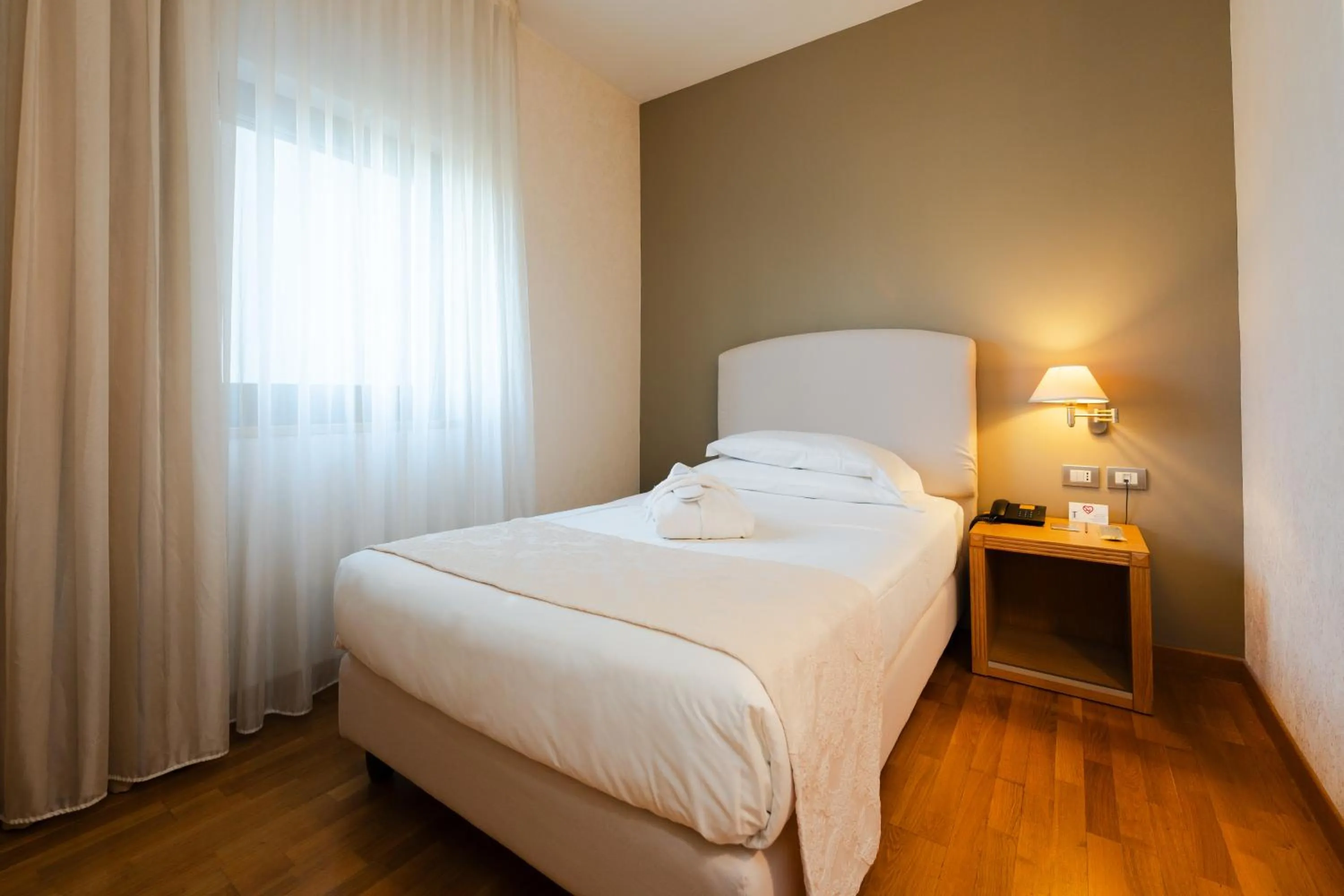 Bed in Hotel Touring