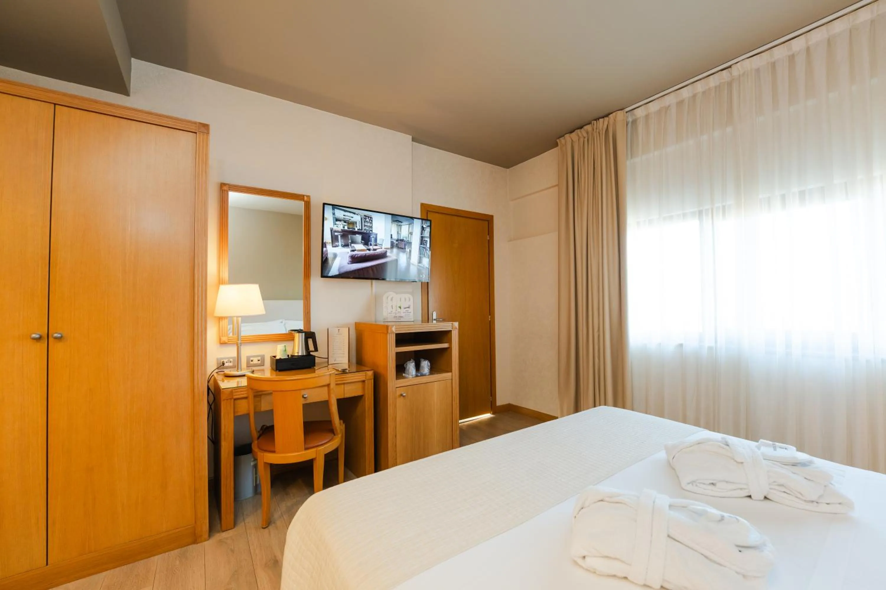 Bed in Hotel Touring