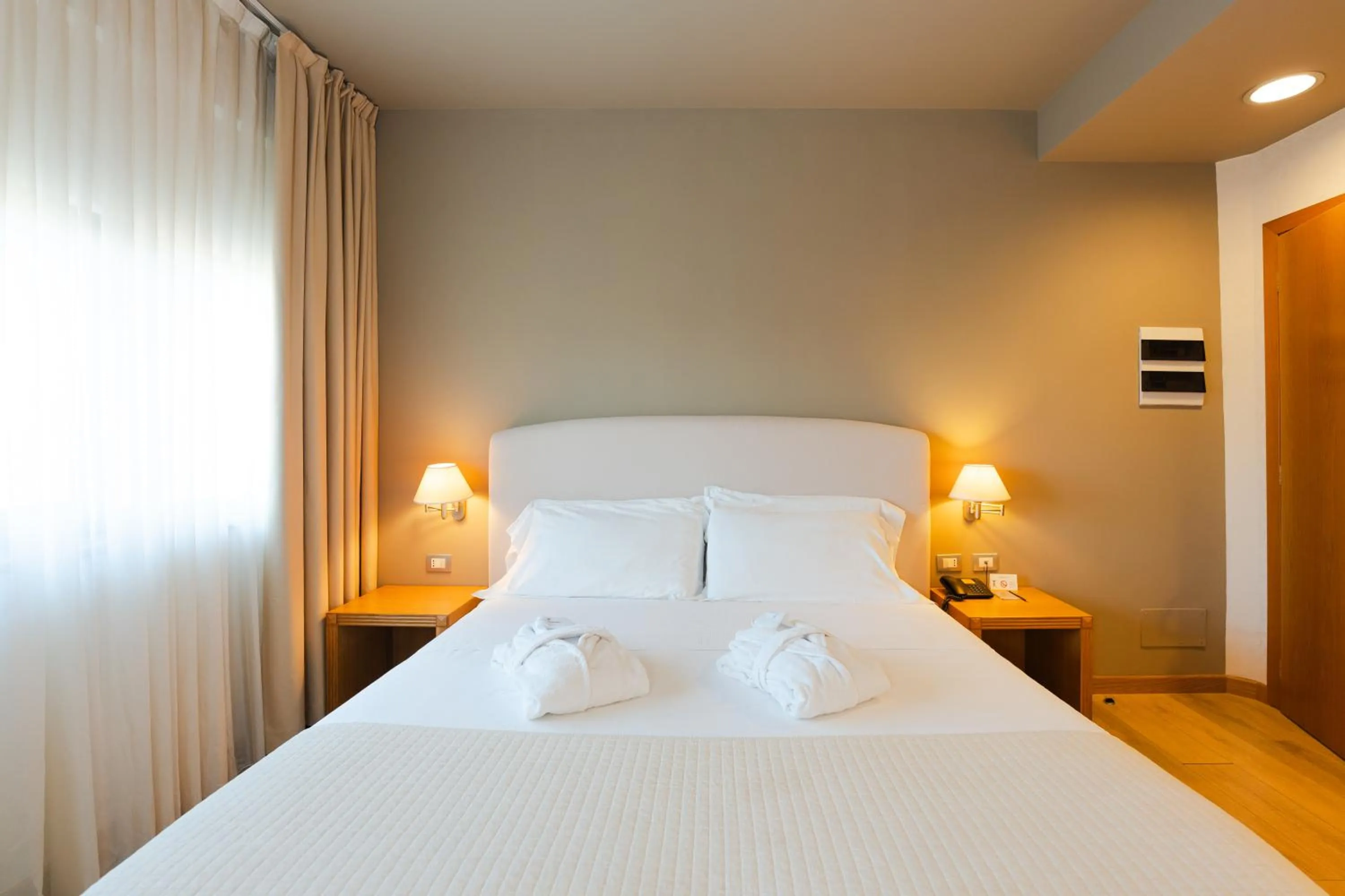 Bed in Hotel Touring