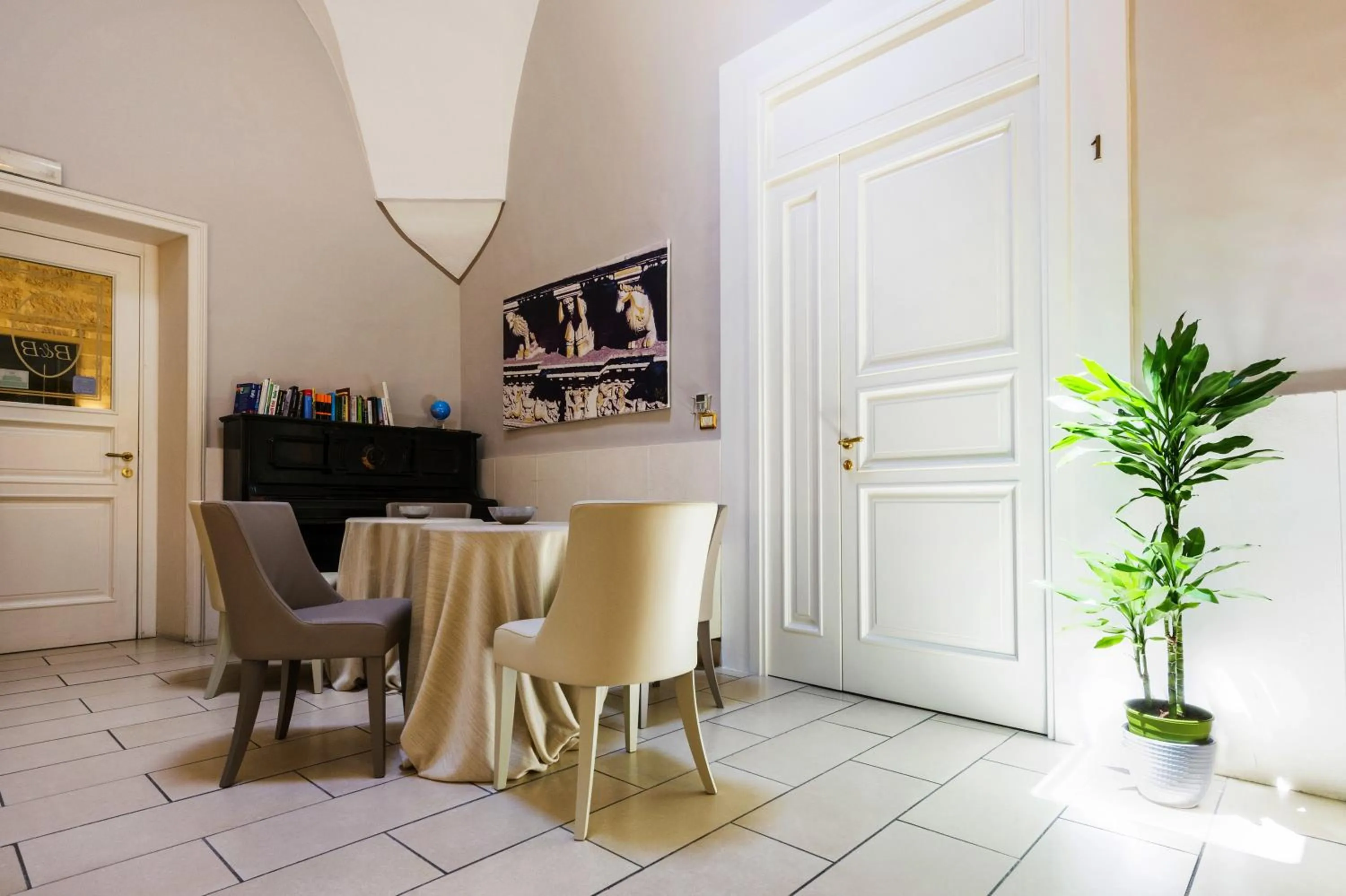 Communal lounge/ TV room in B&B Centro Storico Lecce