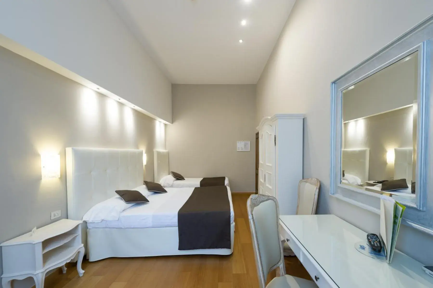 Triple Room in Hotel Cosimo de' Medici Triple Room in Hotel Cosimo de' Medici