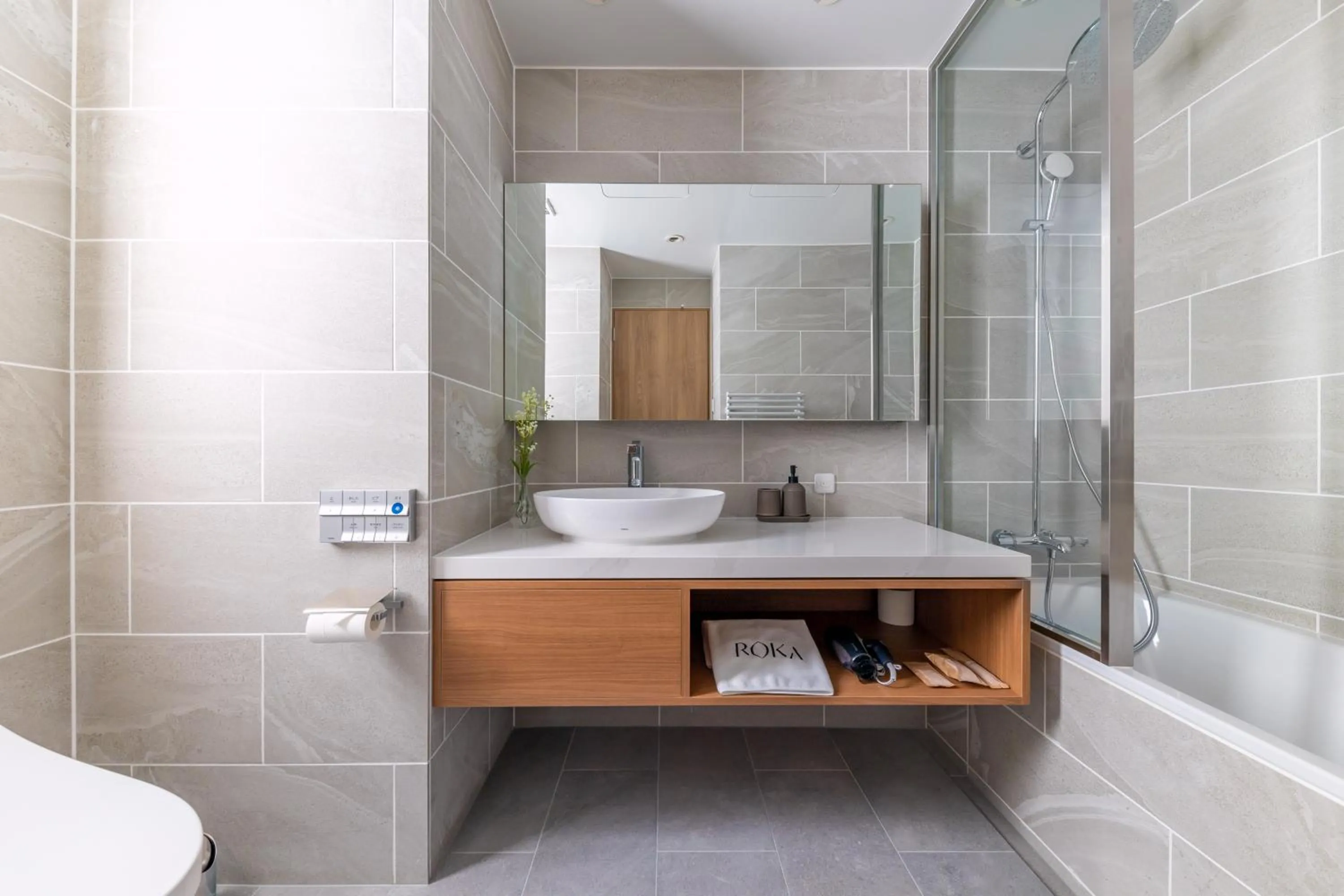 Bathroom in ROKA by HHG