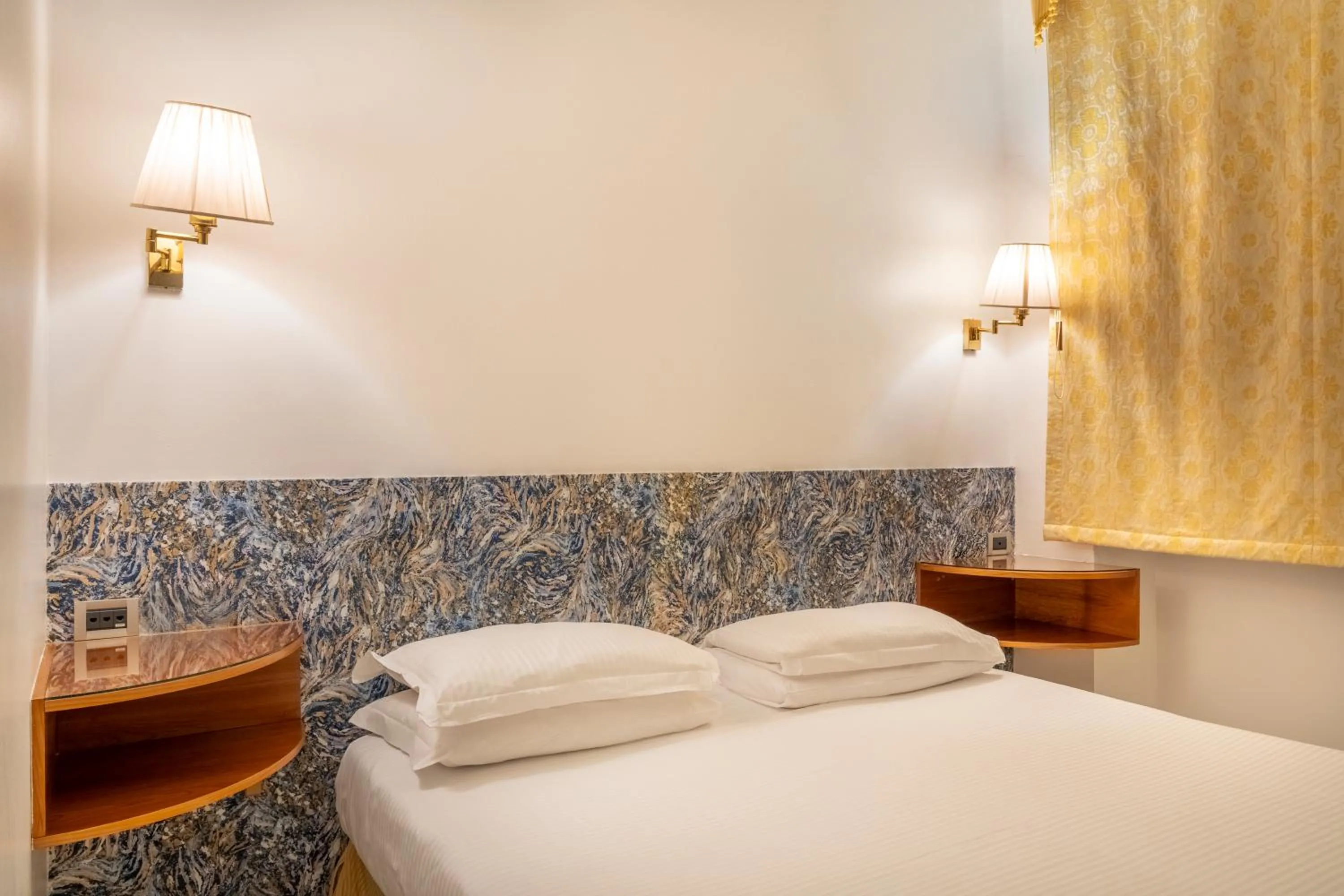 Bed in Hotel Sanpi Milano