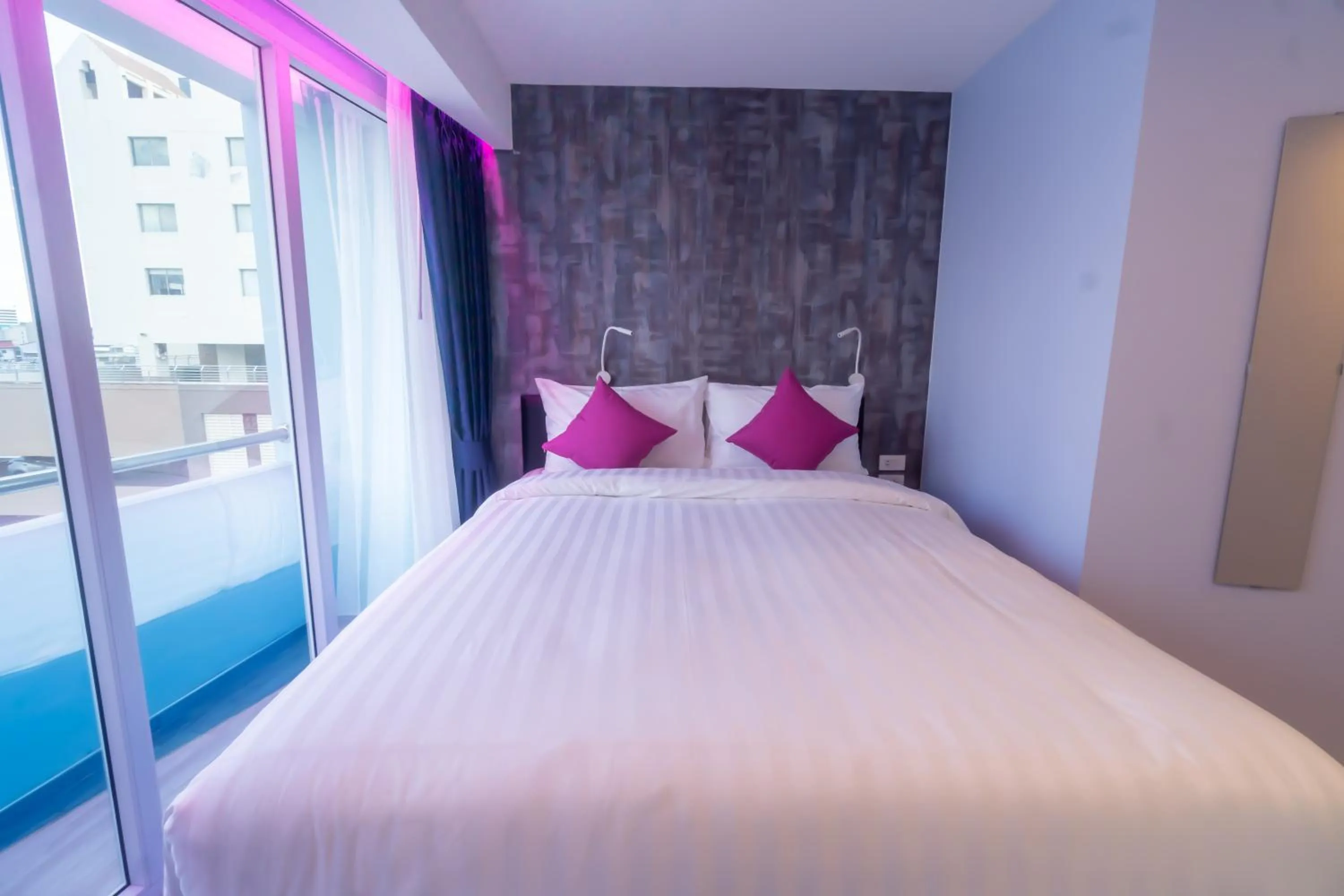 Bedroom, Bed in Spark Hotel - MRT Queen Sirikit - SHA Extra Plus Certified