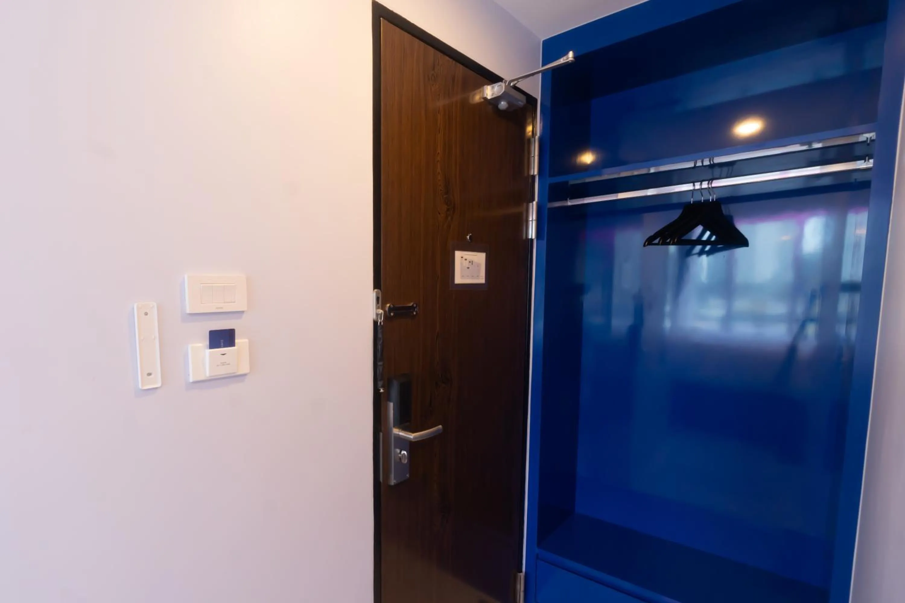 wardrobe in Spark Hotel - MRT Queen Sirikit - SHA Extra Plus Certified