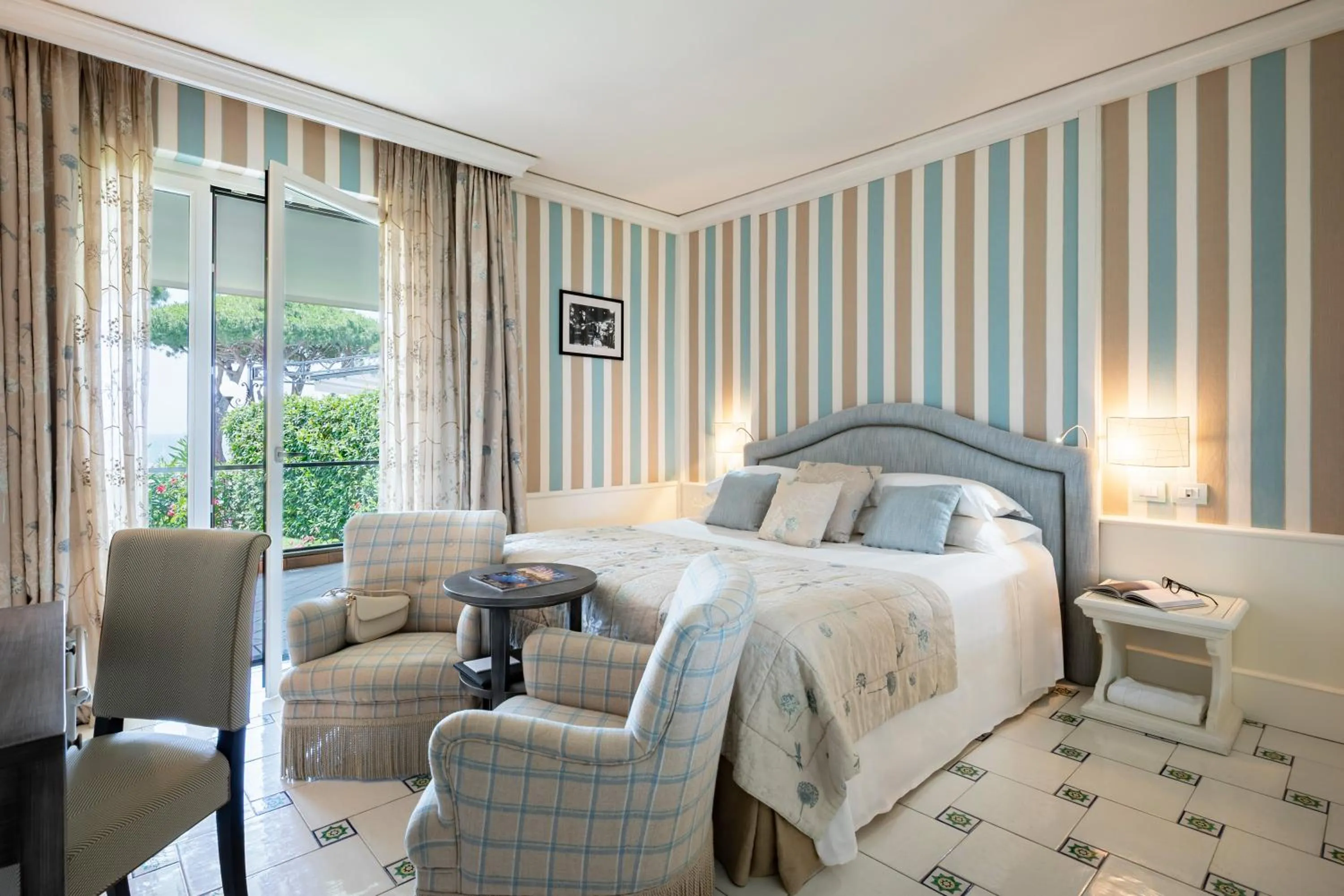 Photo of the whole room, Bed in Cala del Porto Punta Ala - Preferred Hotels