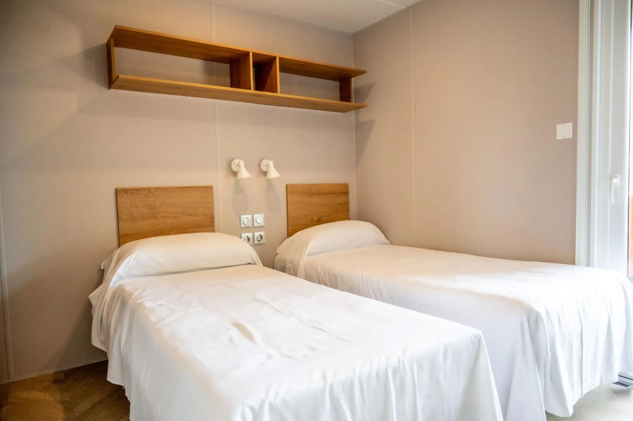 Bed in Flaminio Village Bungalow Park