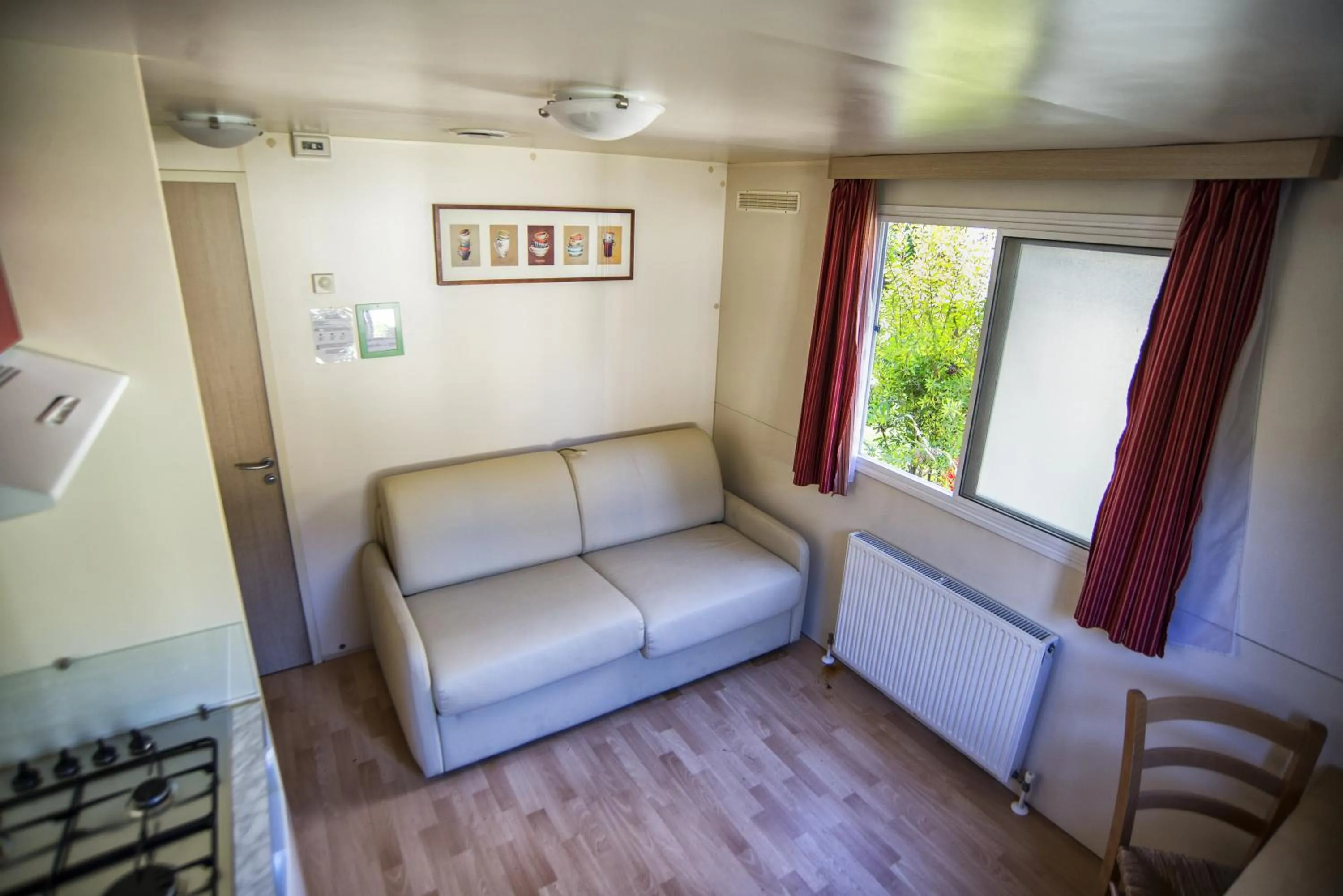 Living room in Flaminio Village Bungalow Park