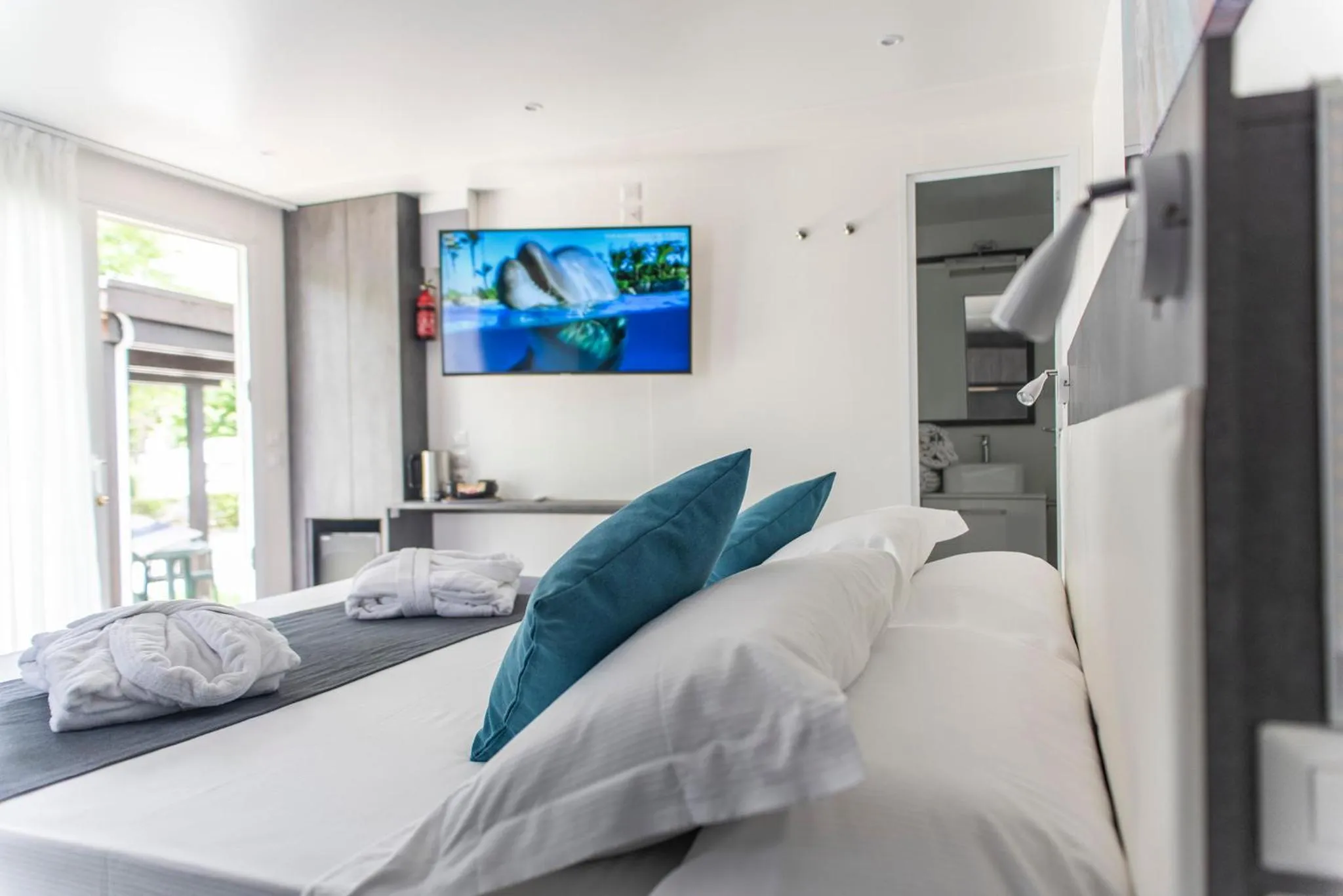 Bed in Flaminio Village Bungalow Park