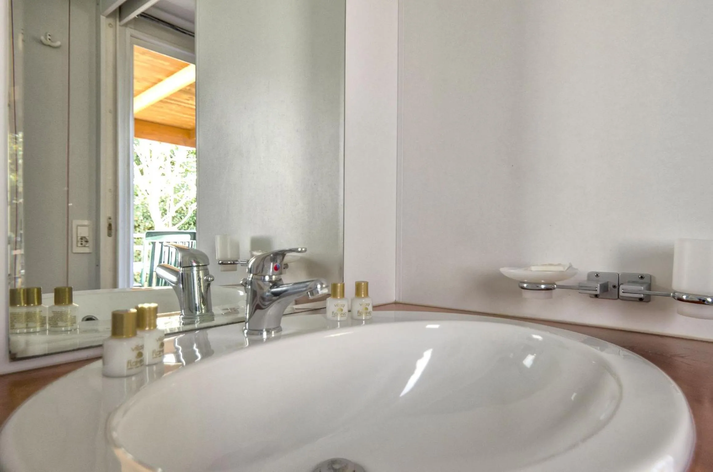 Bathroom in Flaminio Village Bungalow Park