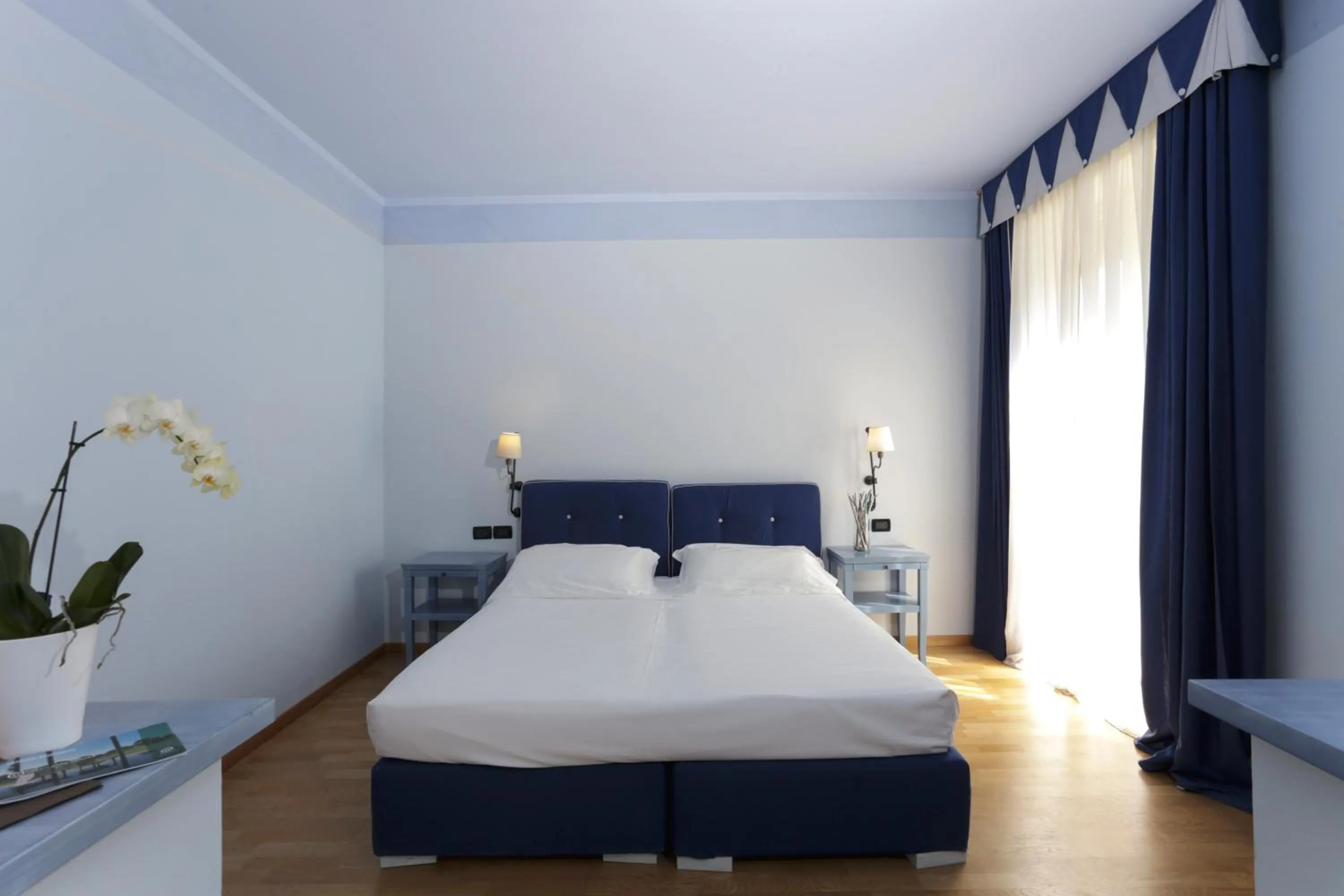 Photo of the whole room, Bed in TH Tirrenia - Green Park Resort