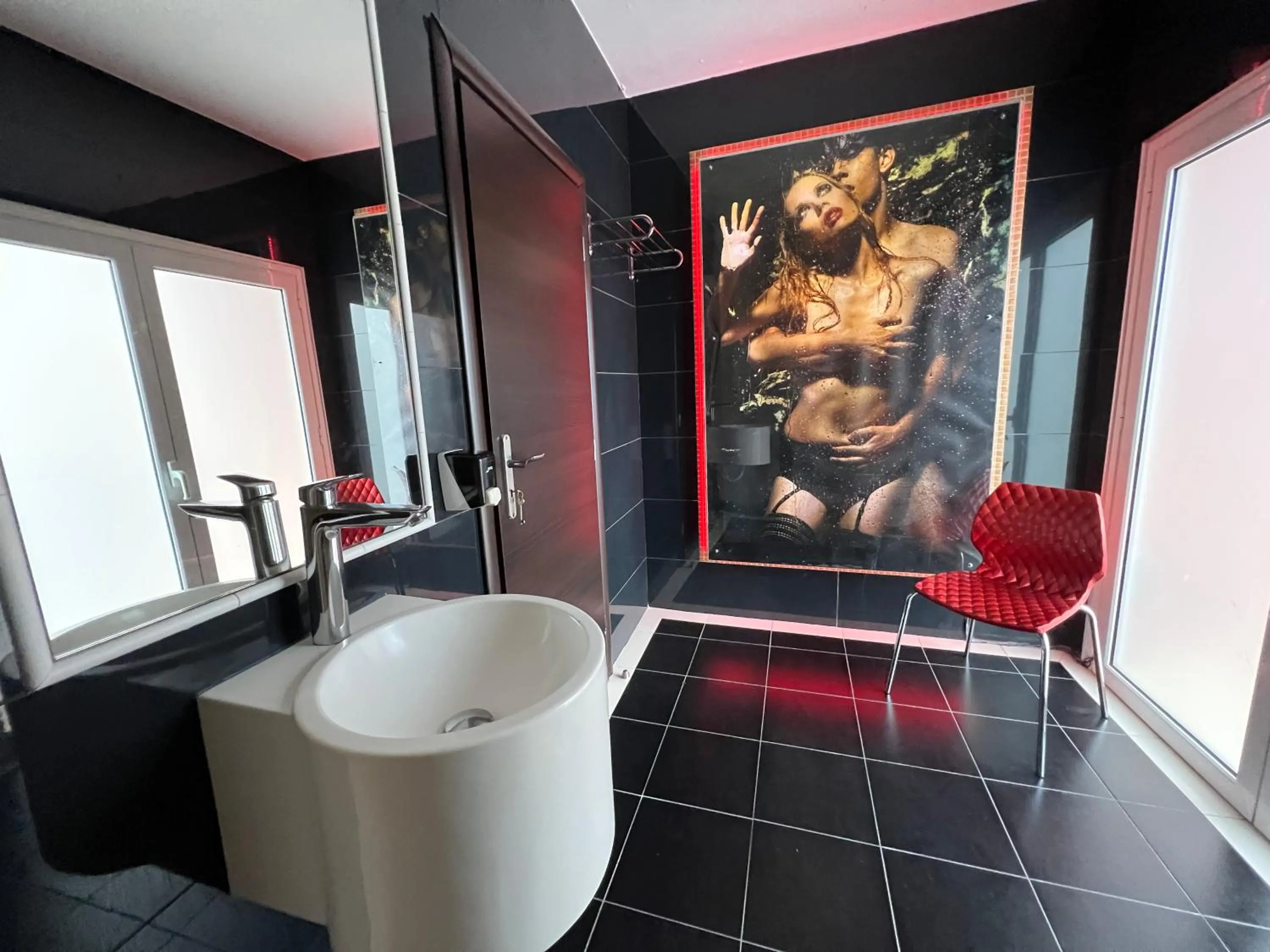 Bathroom in Xcite Hotel Salem