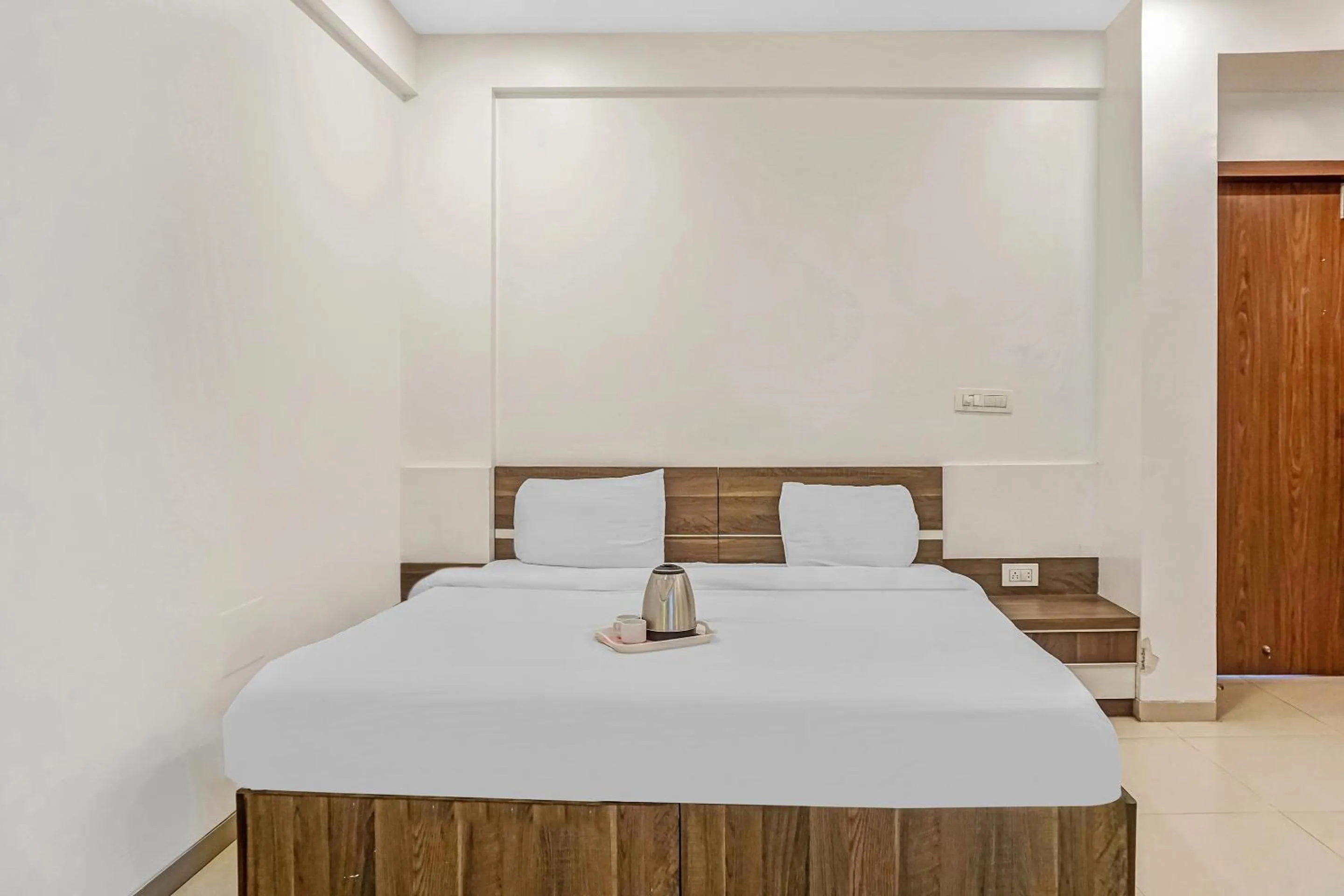 Bedroom, Bed in Super Townhouse The Upper Room Near Pune Airport