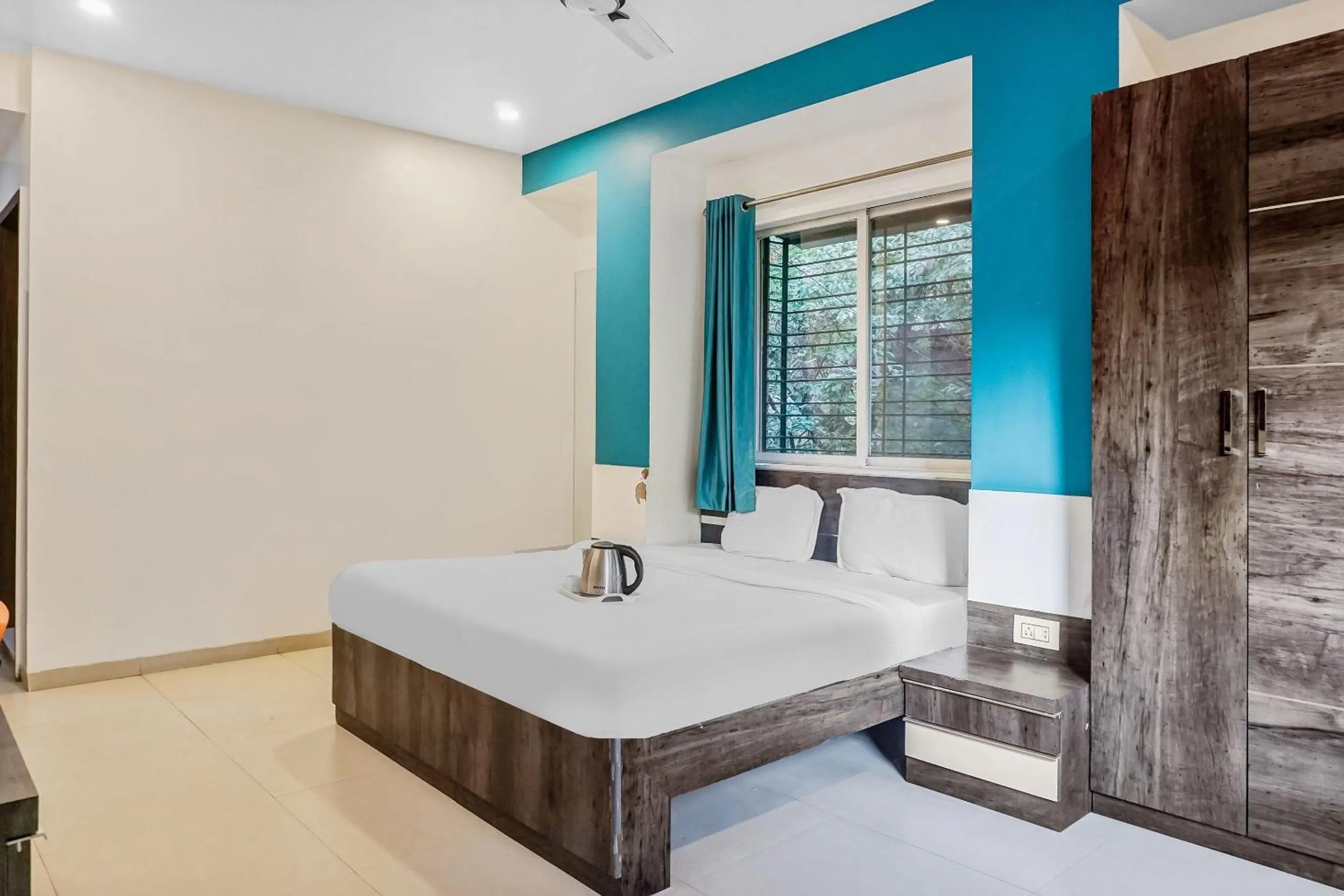 Bedroom, Bed in Super Townhouse The Upper Room Near Pune Airport