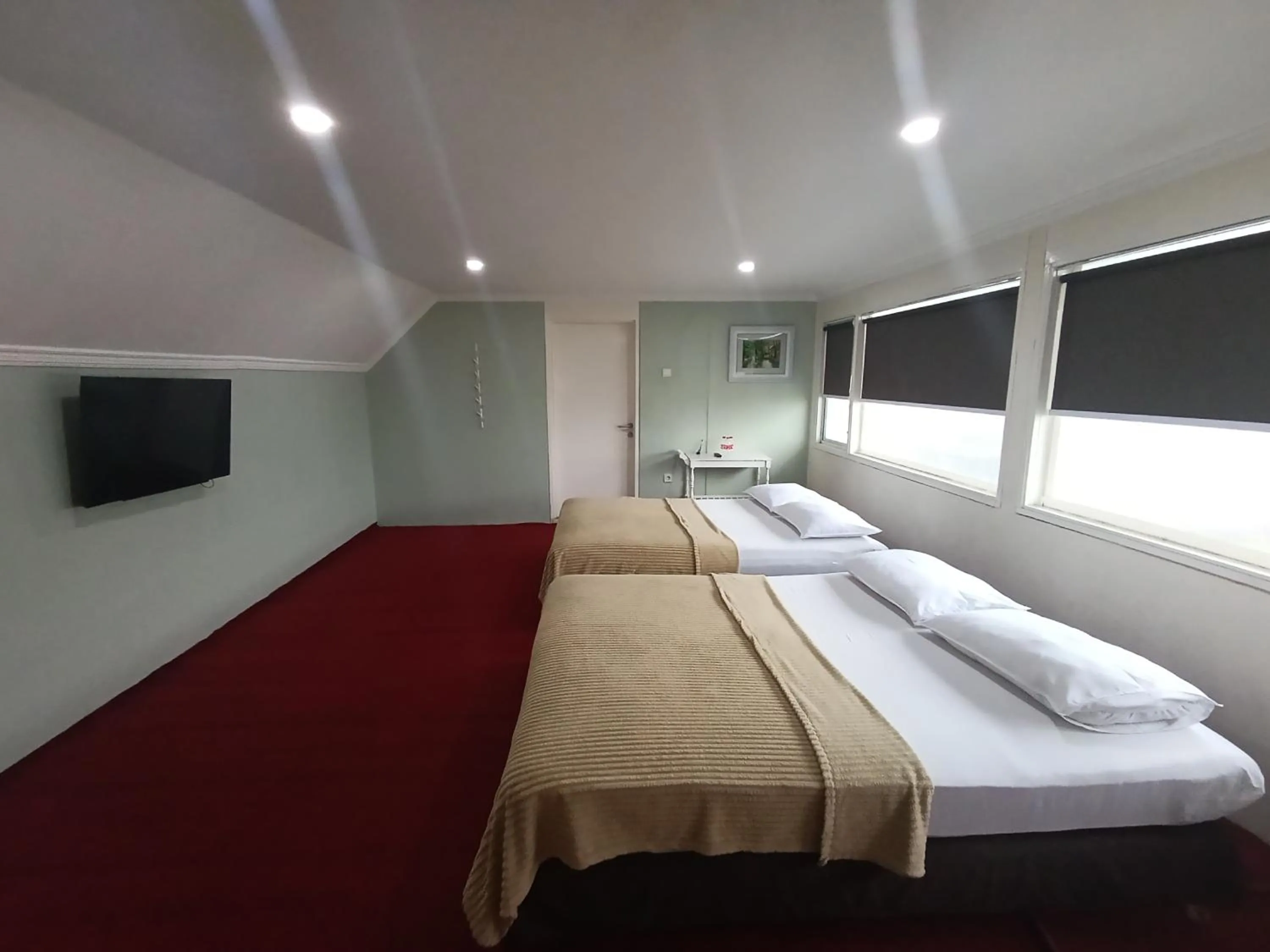 Bed in Mamifokobo Guest House
