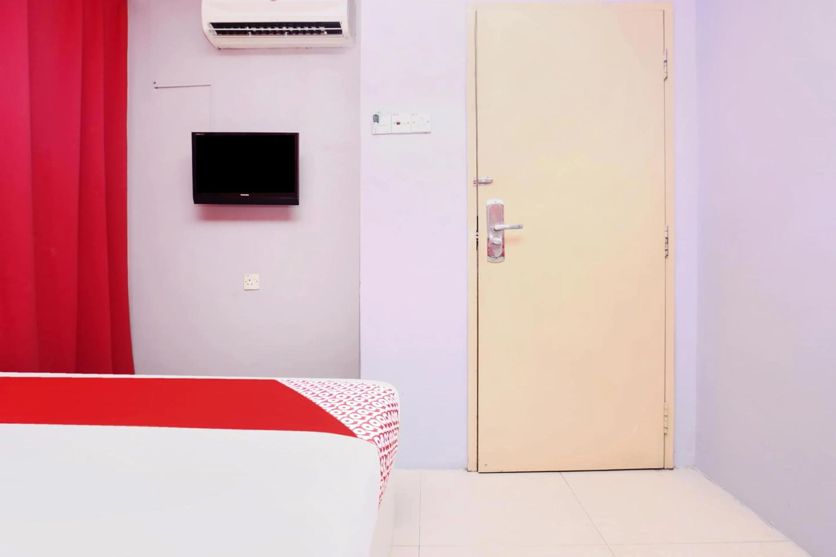 Bedroom in Hotel O My New Home Hotel