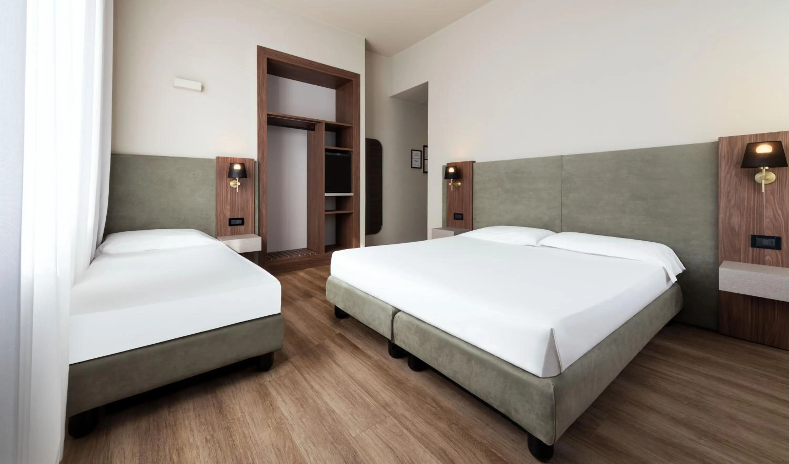 Bed in Mokinba Hotels Montebianco