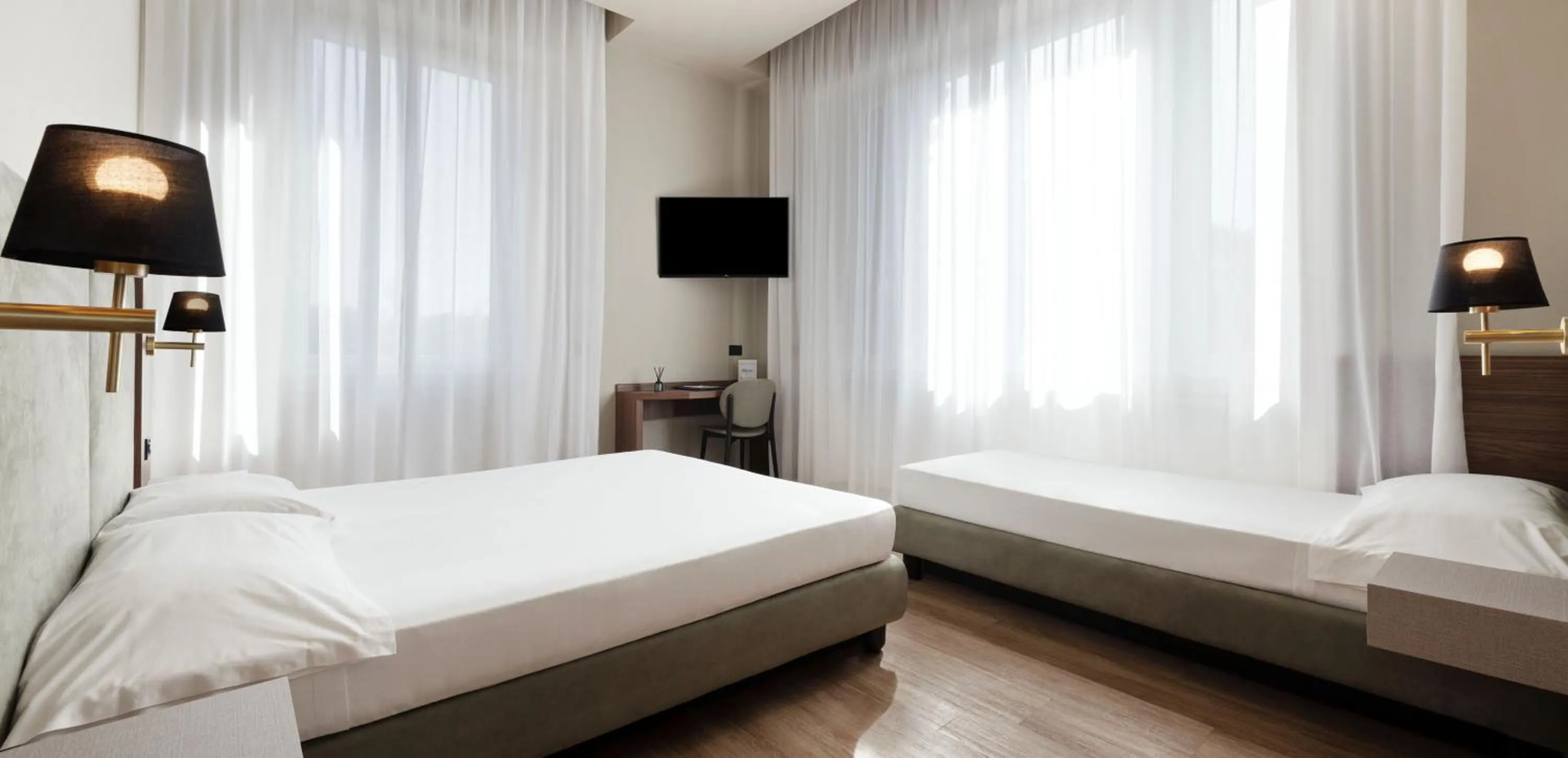 Bed in Mokinba Hotels Montebianco