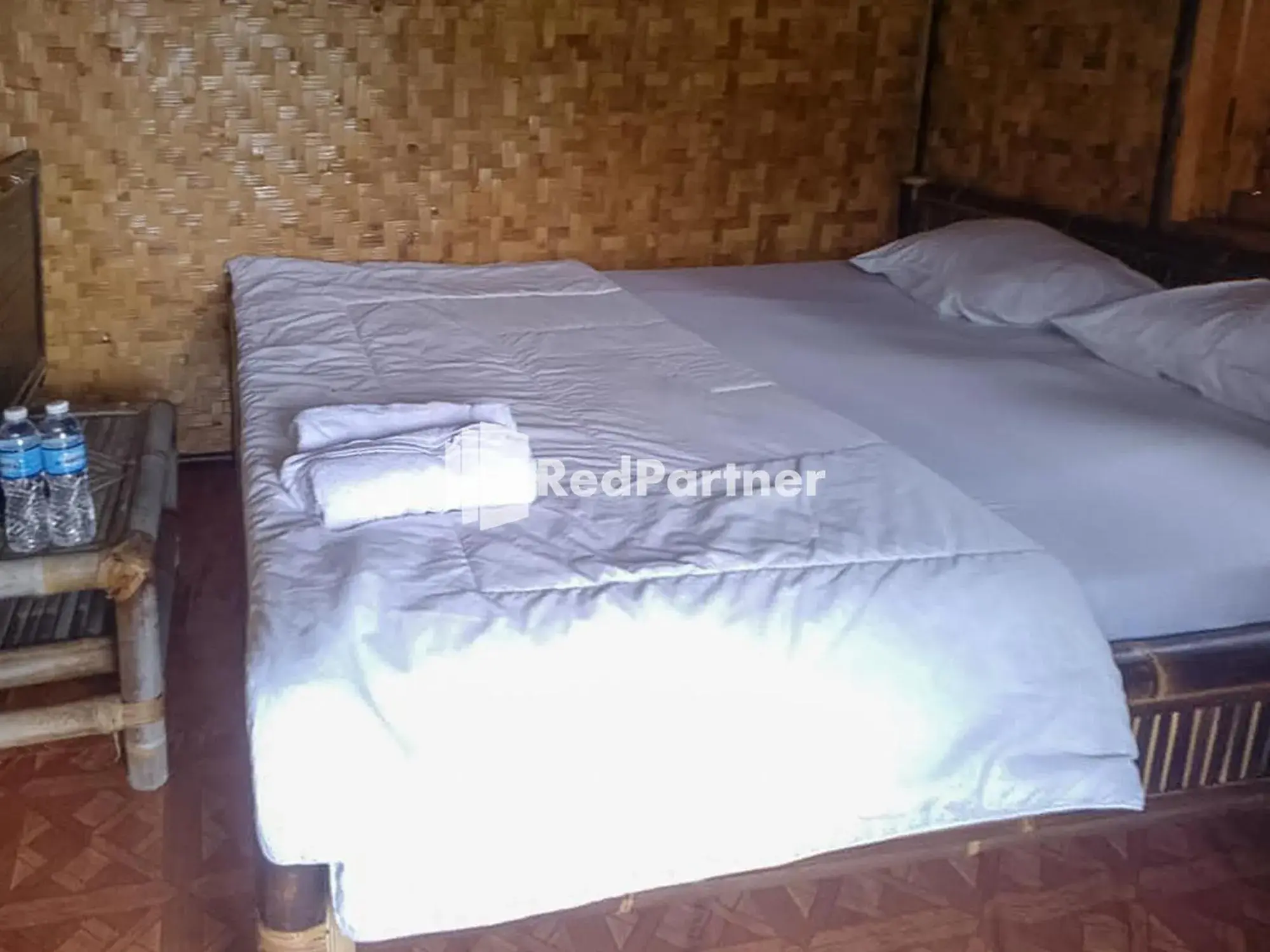 Bed in De Salak Homestay Gunung Salak RedPartner Bed in De Salak Homestay Gunung Salak RedPartner