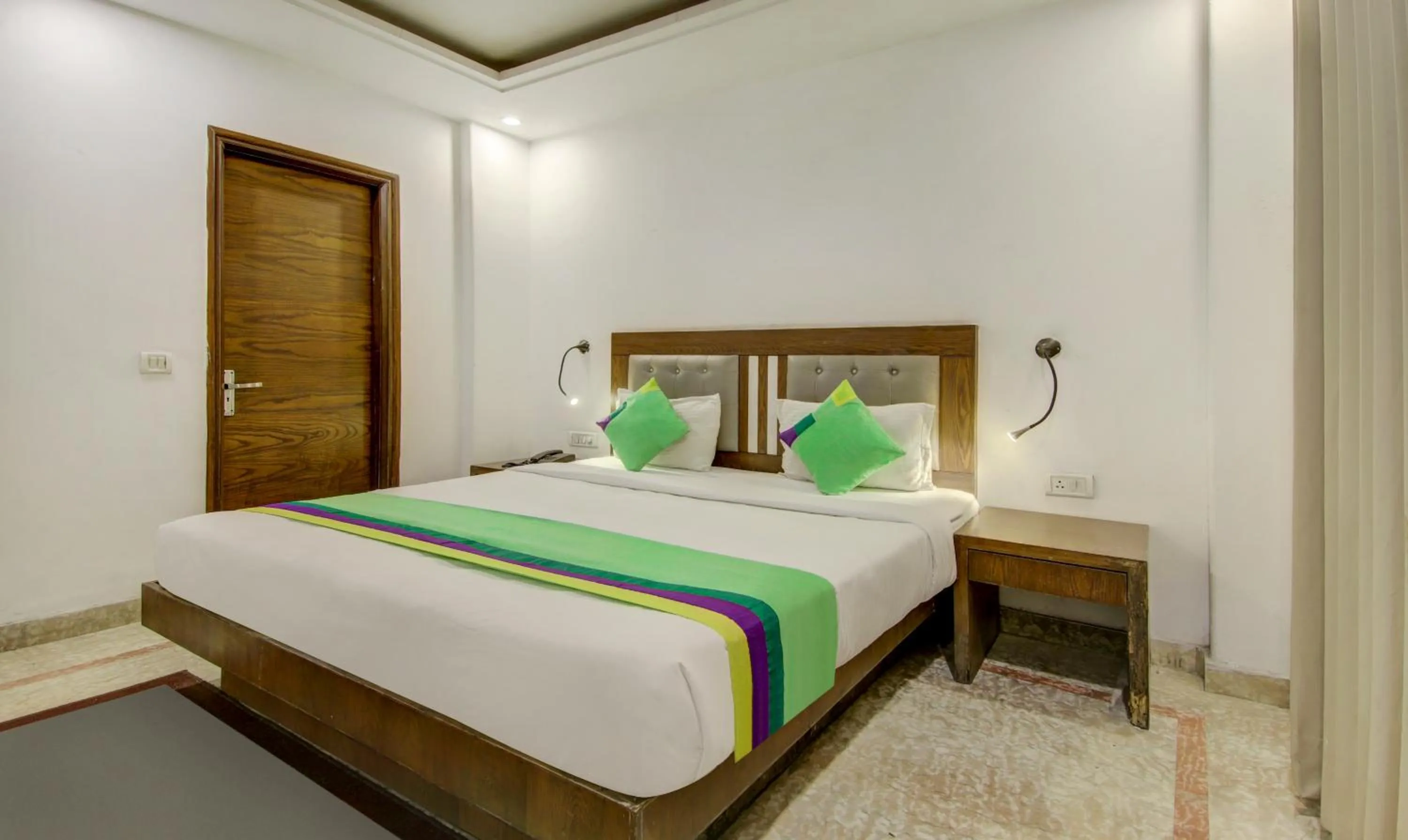 Bedroom, Bed in Treebo The Kings Plaza