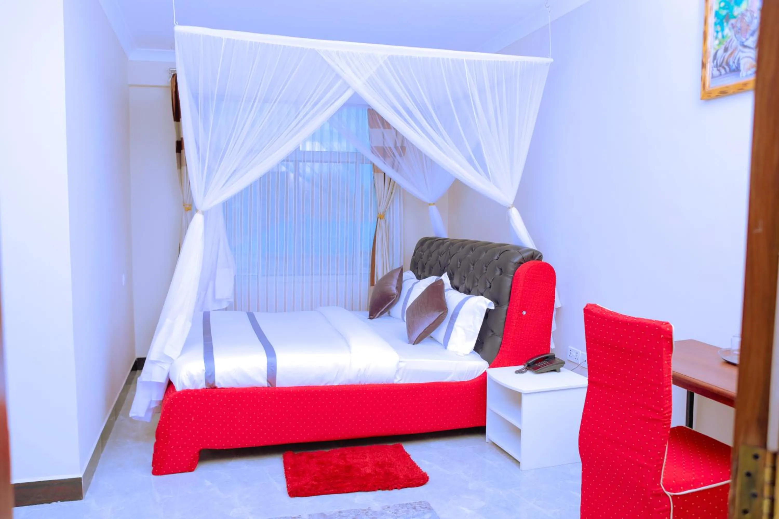 Bed in Elanacha Hotel