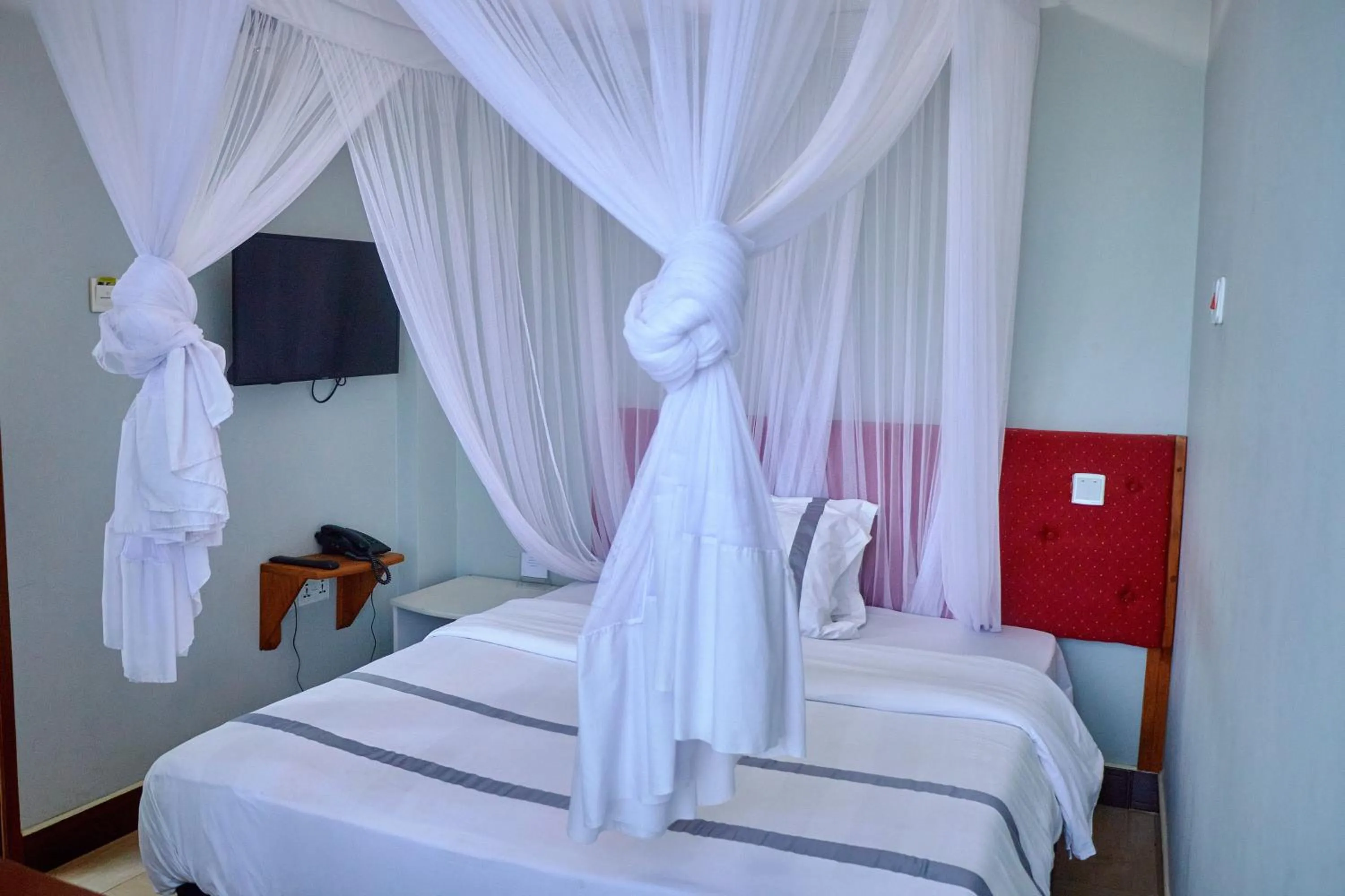 Bed in Elanacha Hotel