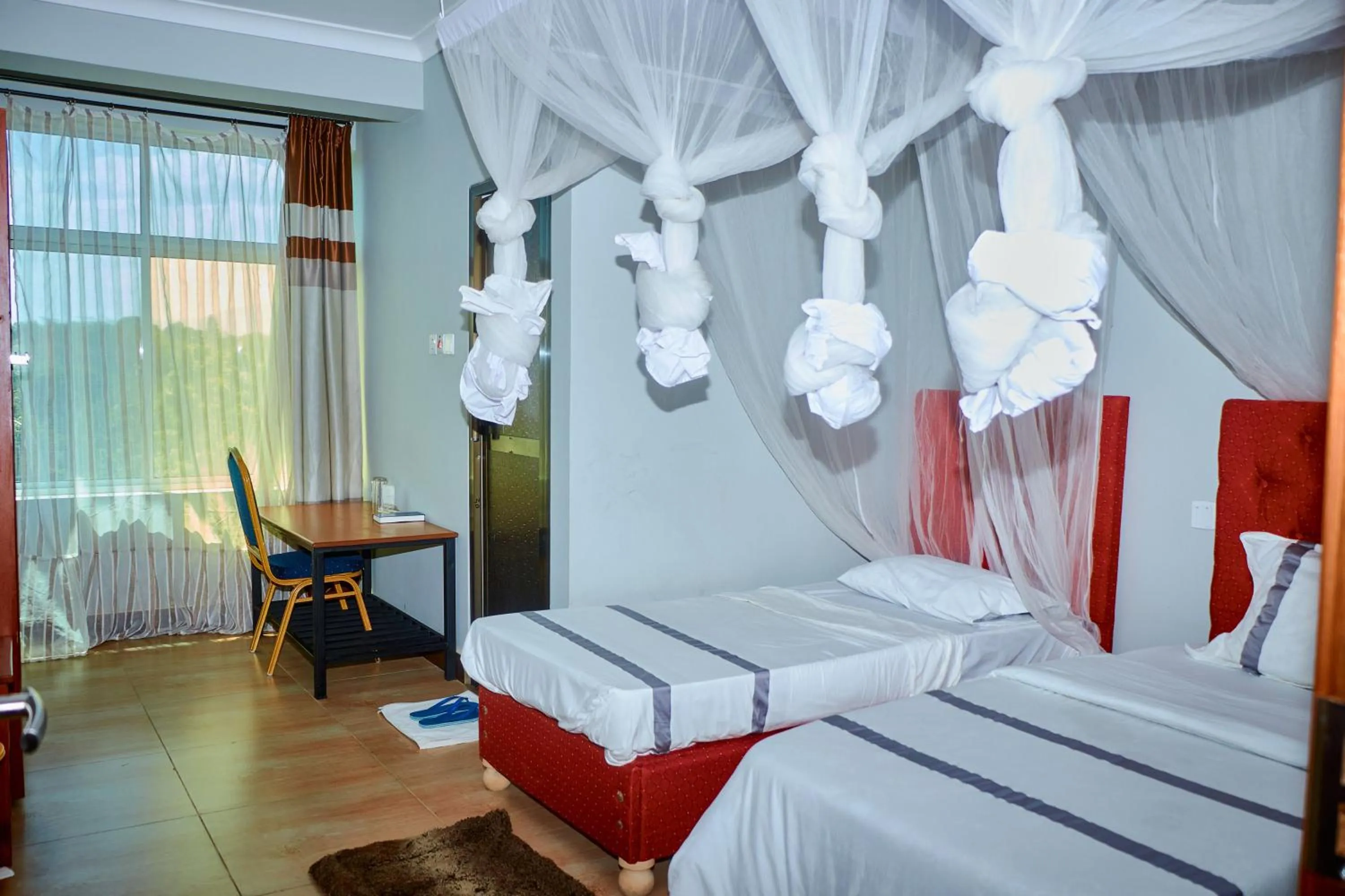 Bed in Elanacha Hotel