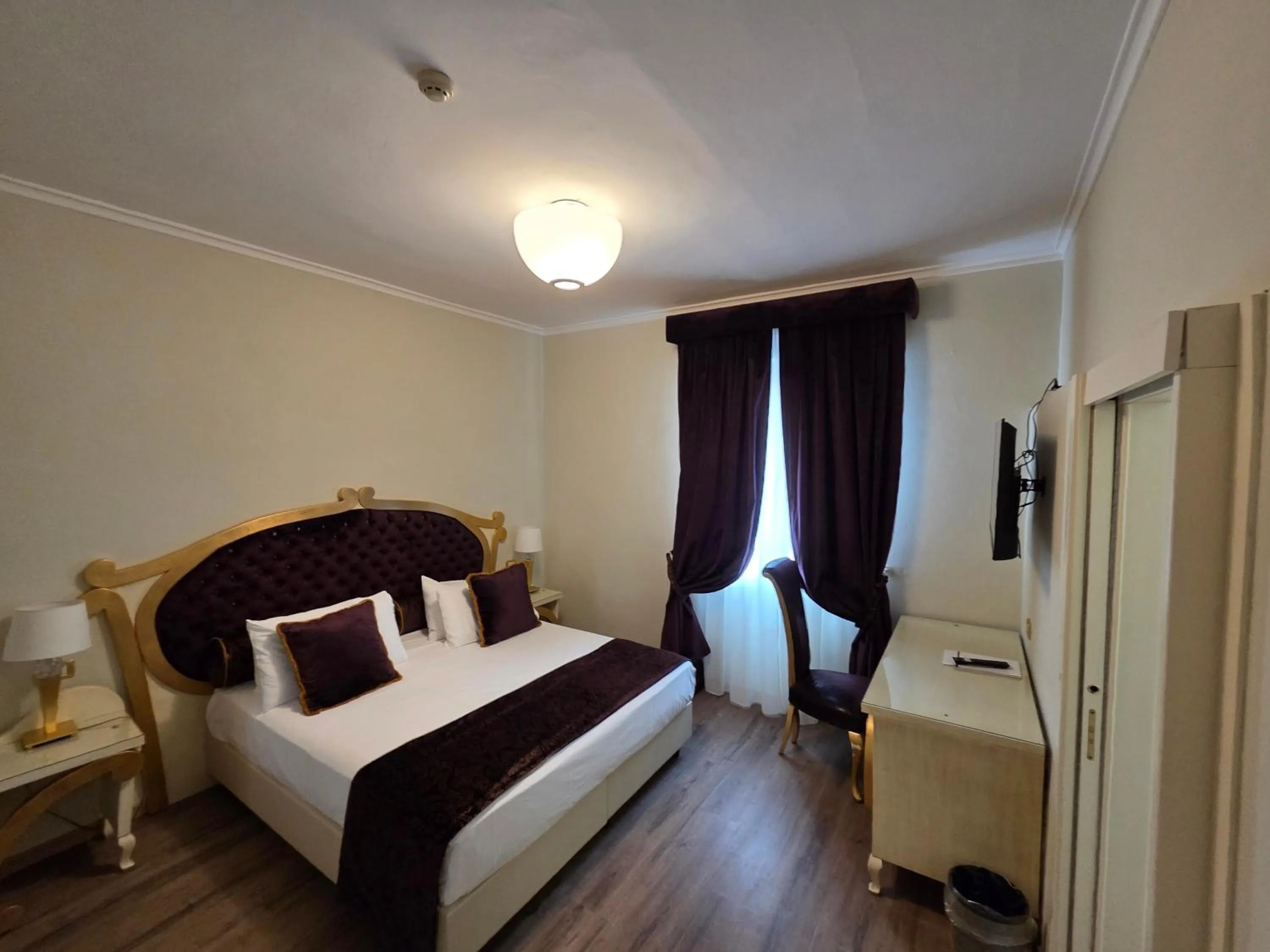 Bed in Zanhotel Tre Vecchi