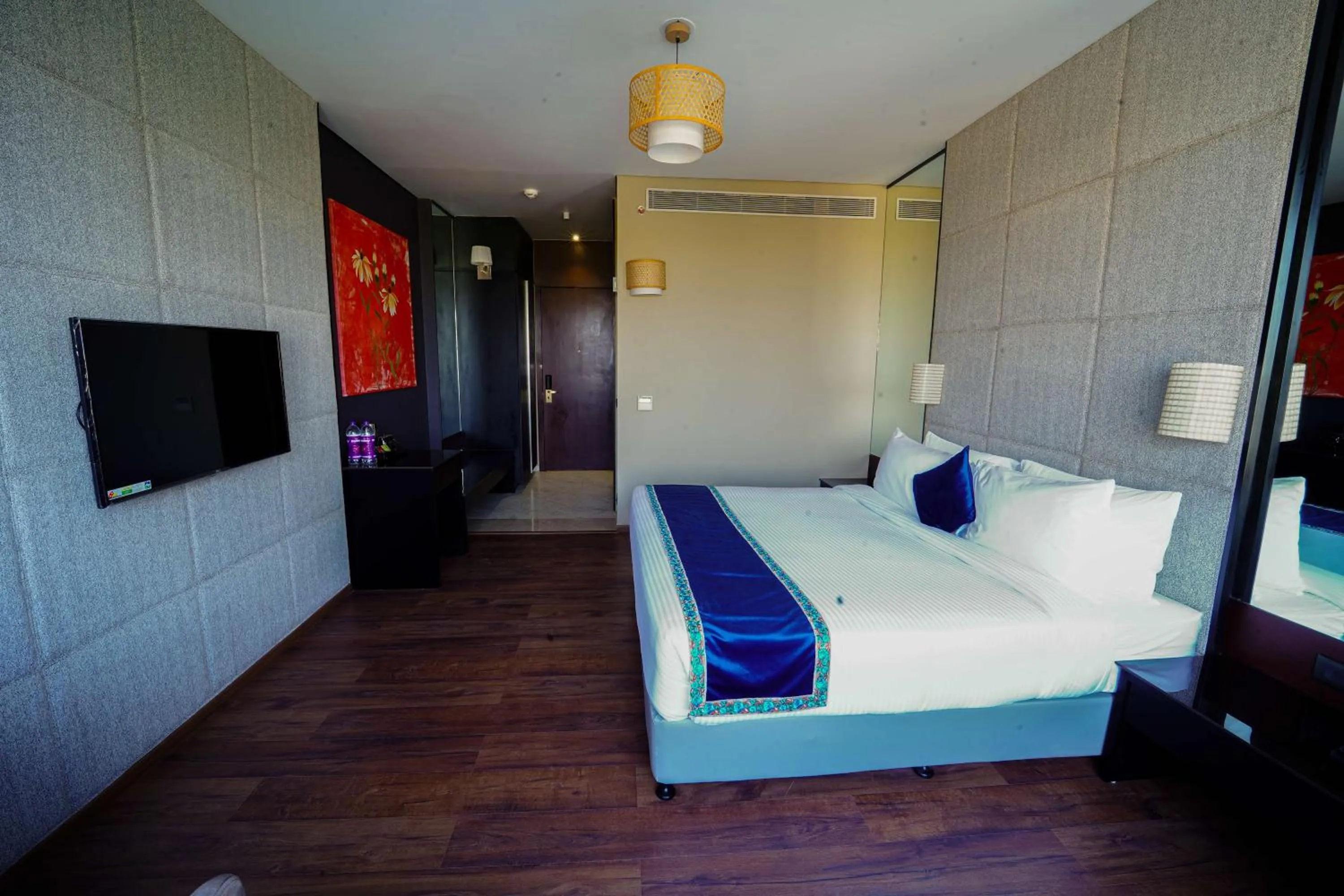 Photo of the whole room, Bed in Essentia Luxury Hotel Indore
