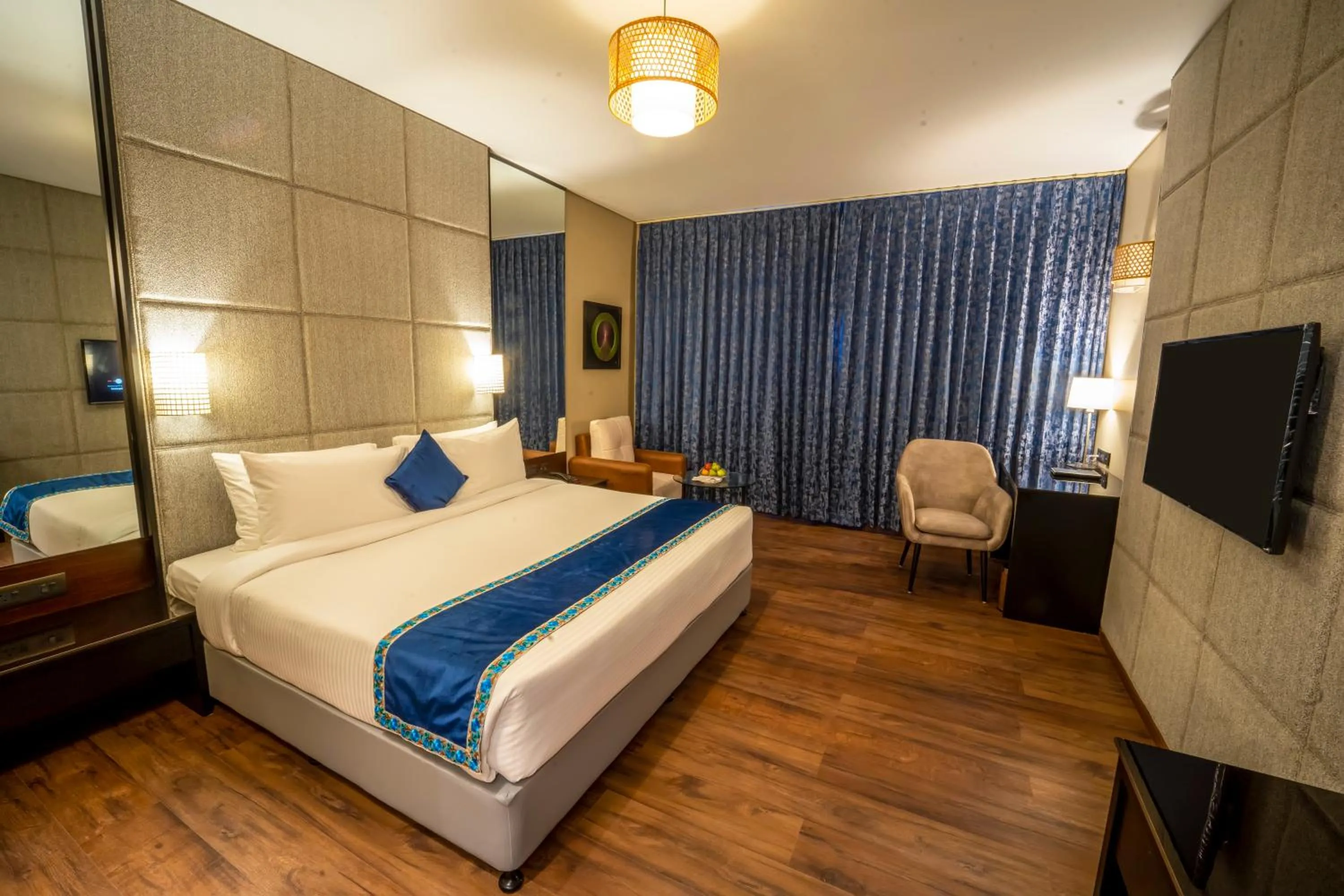 Photo of the whole room, Bed in Essentia Luxury Hotel Indore