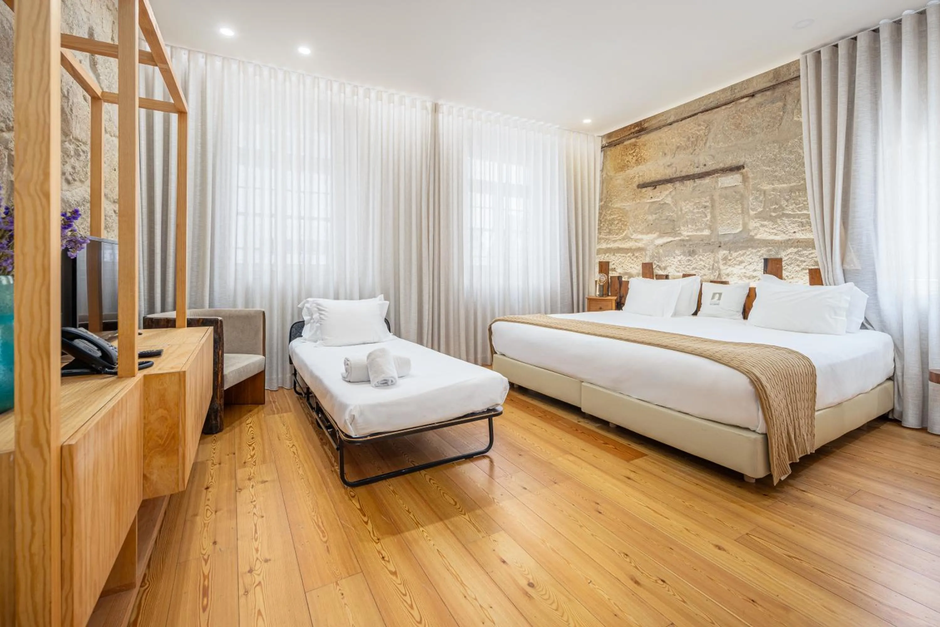 Bed in Porta Nobre Boutique Hotel by Aspasios