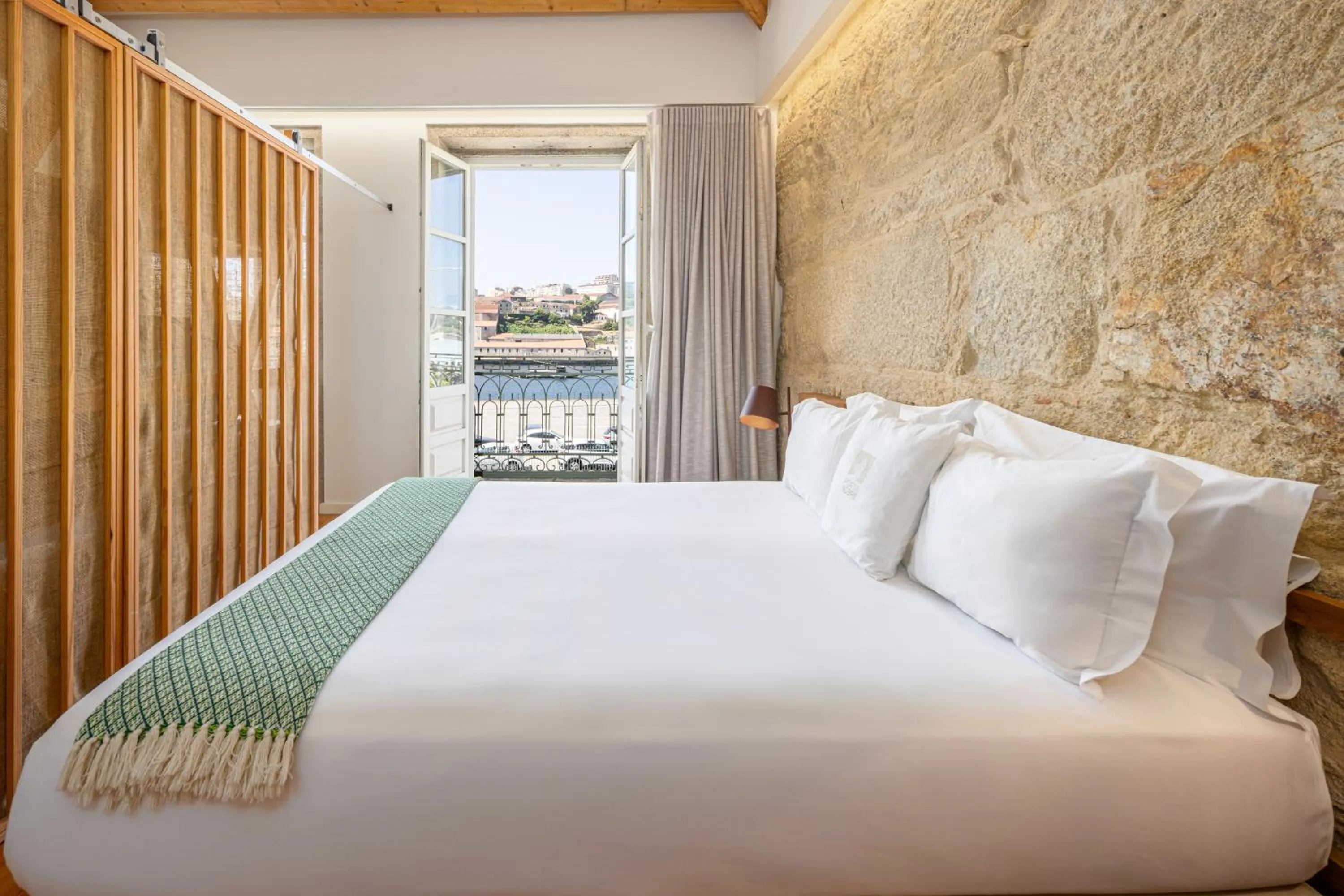 Bed in Porta Nobre Boutique Hotel by Aspasios