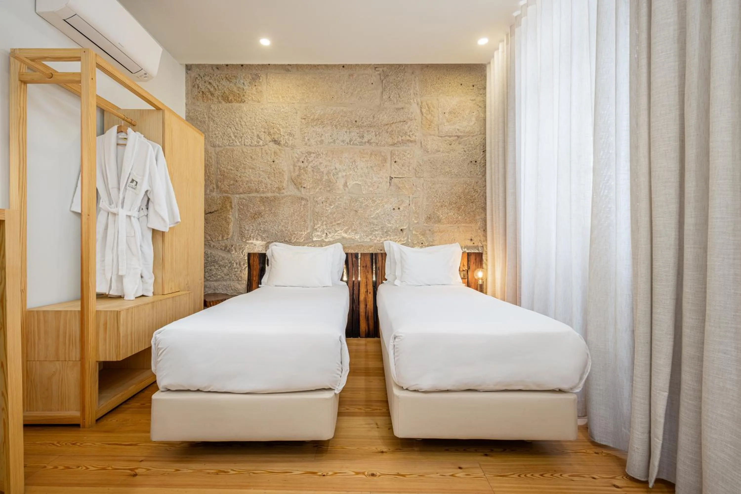 Bed in Porta Nobre Boutique Hotel by Aspasios