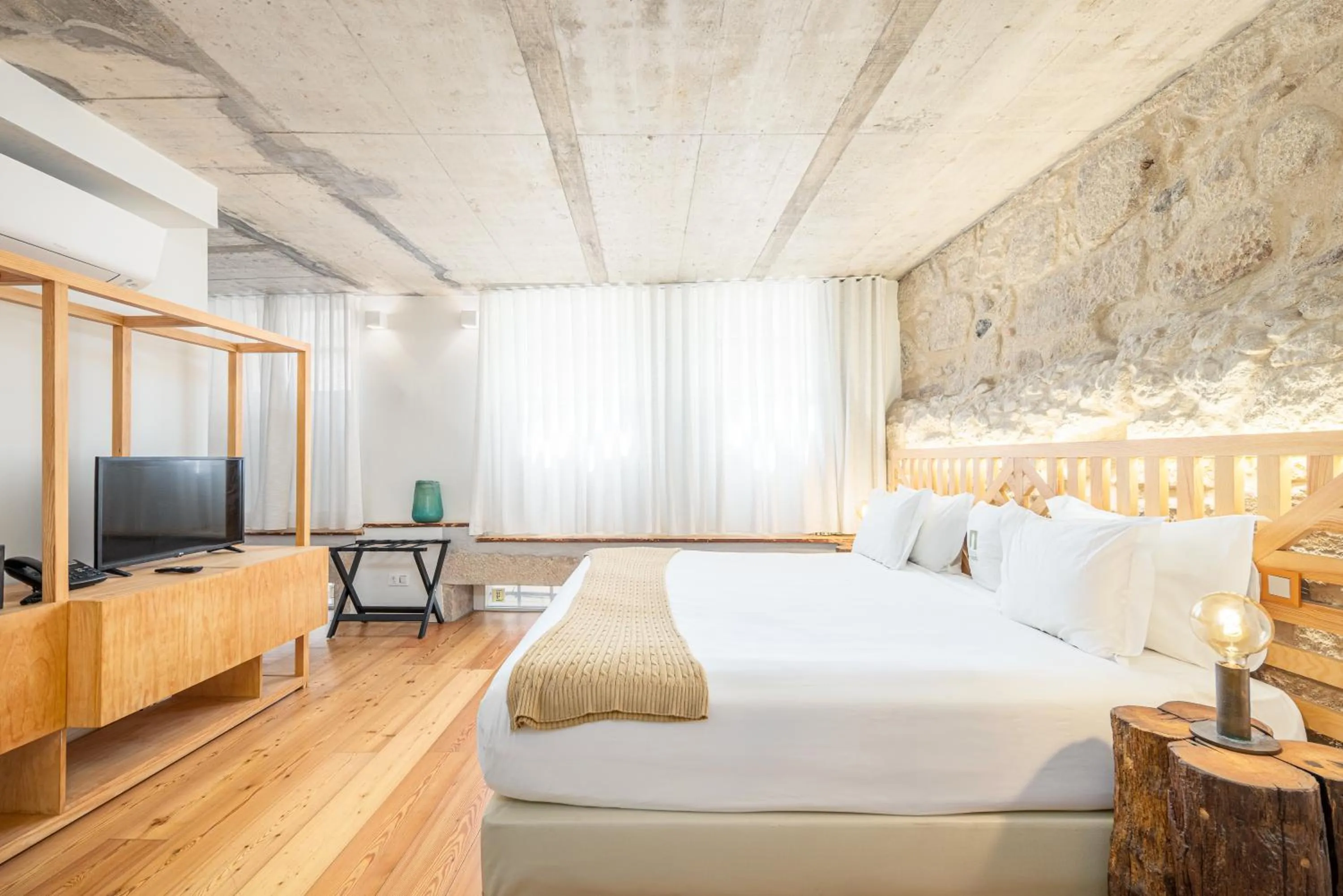 Bed in Porta Nobre Boutique Hotel by Aspasios