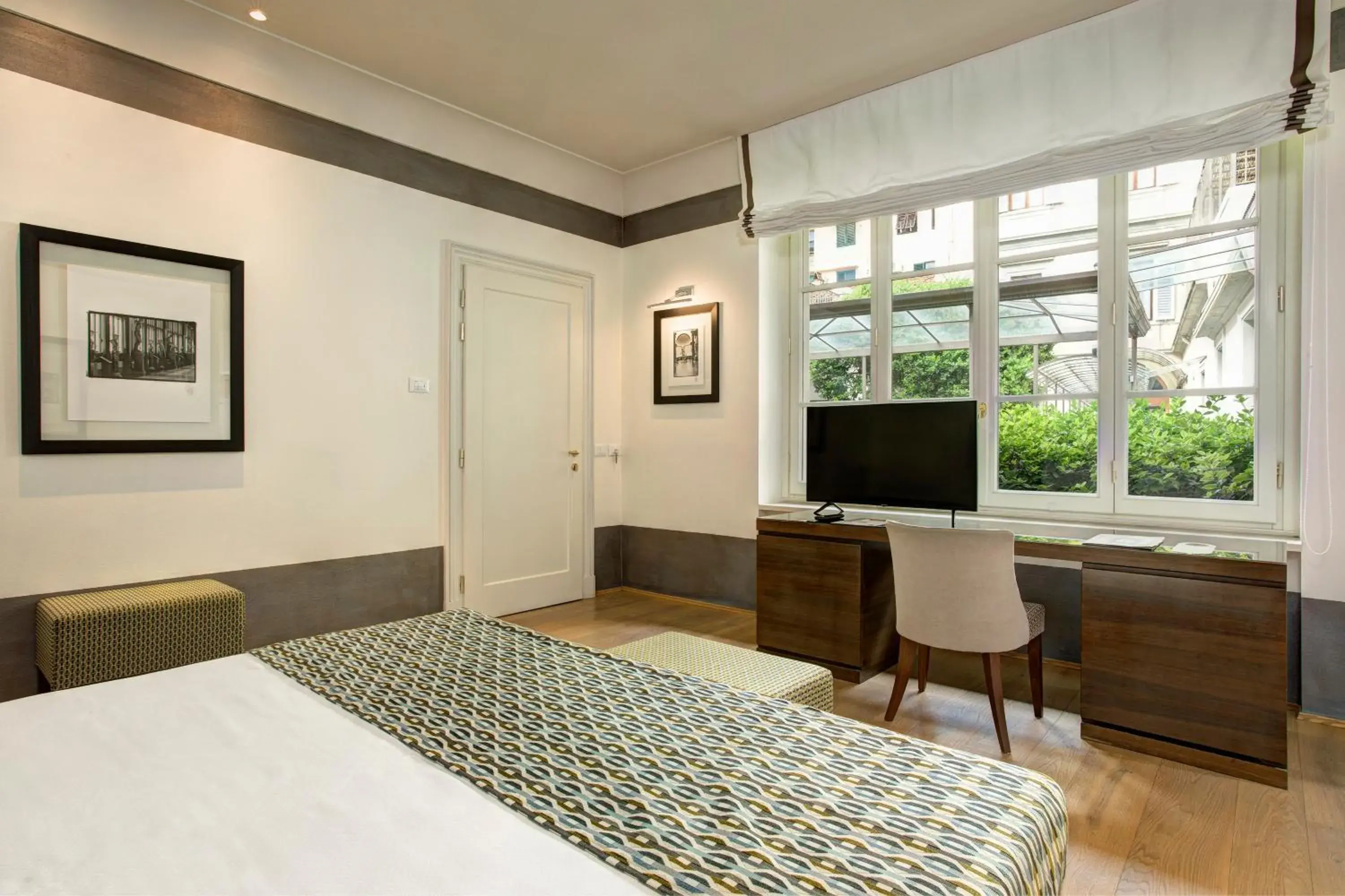 Deluxe Double Room with Garden View in Hotel Orto de' Medici Deluxe Double Room with Garden View in Hotel Orto de' Medici