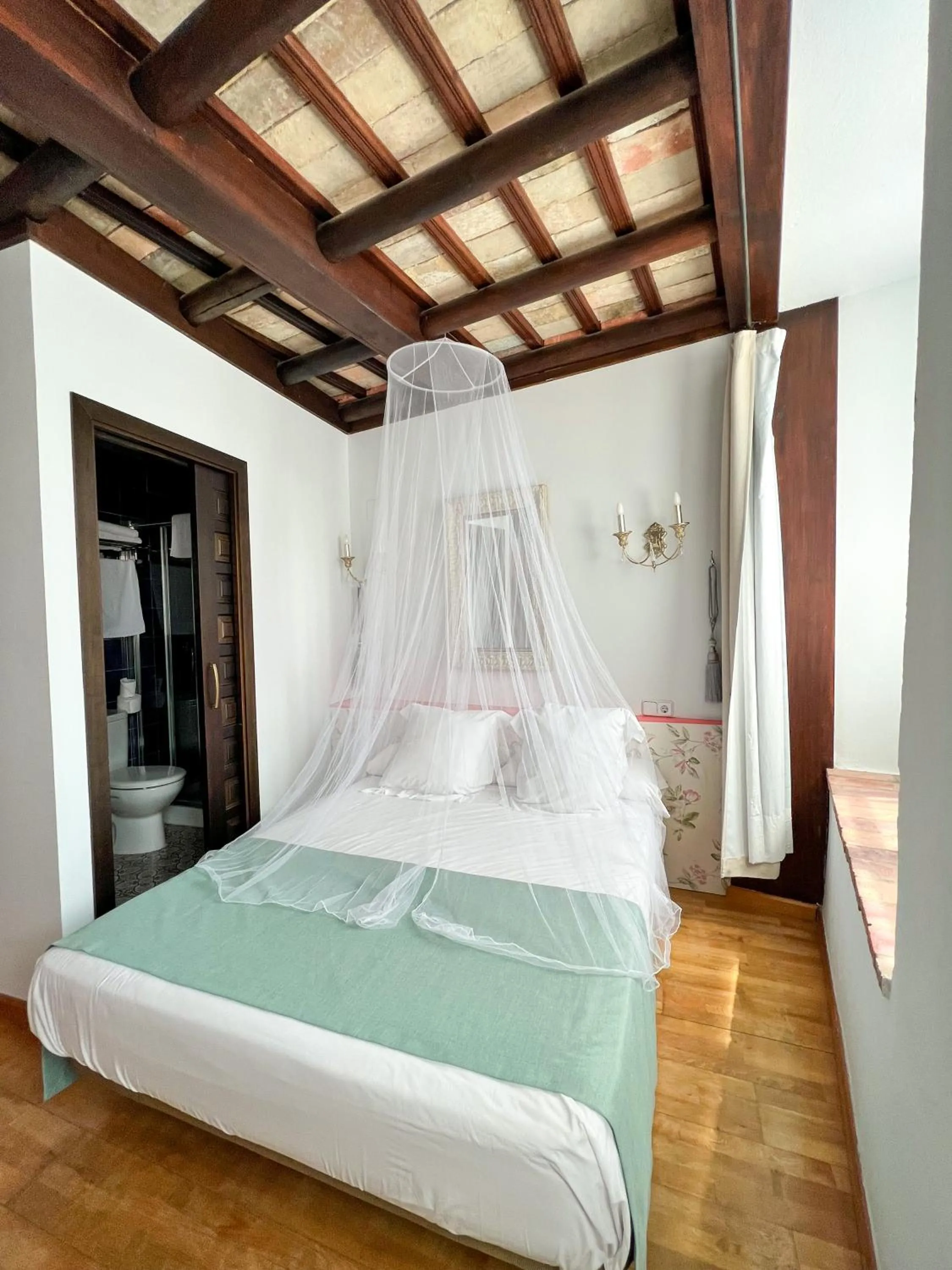 Bed in Hostal Servilia