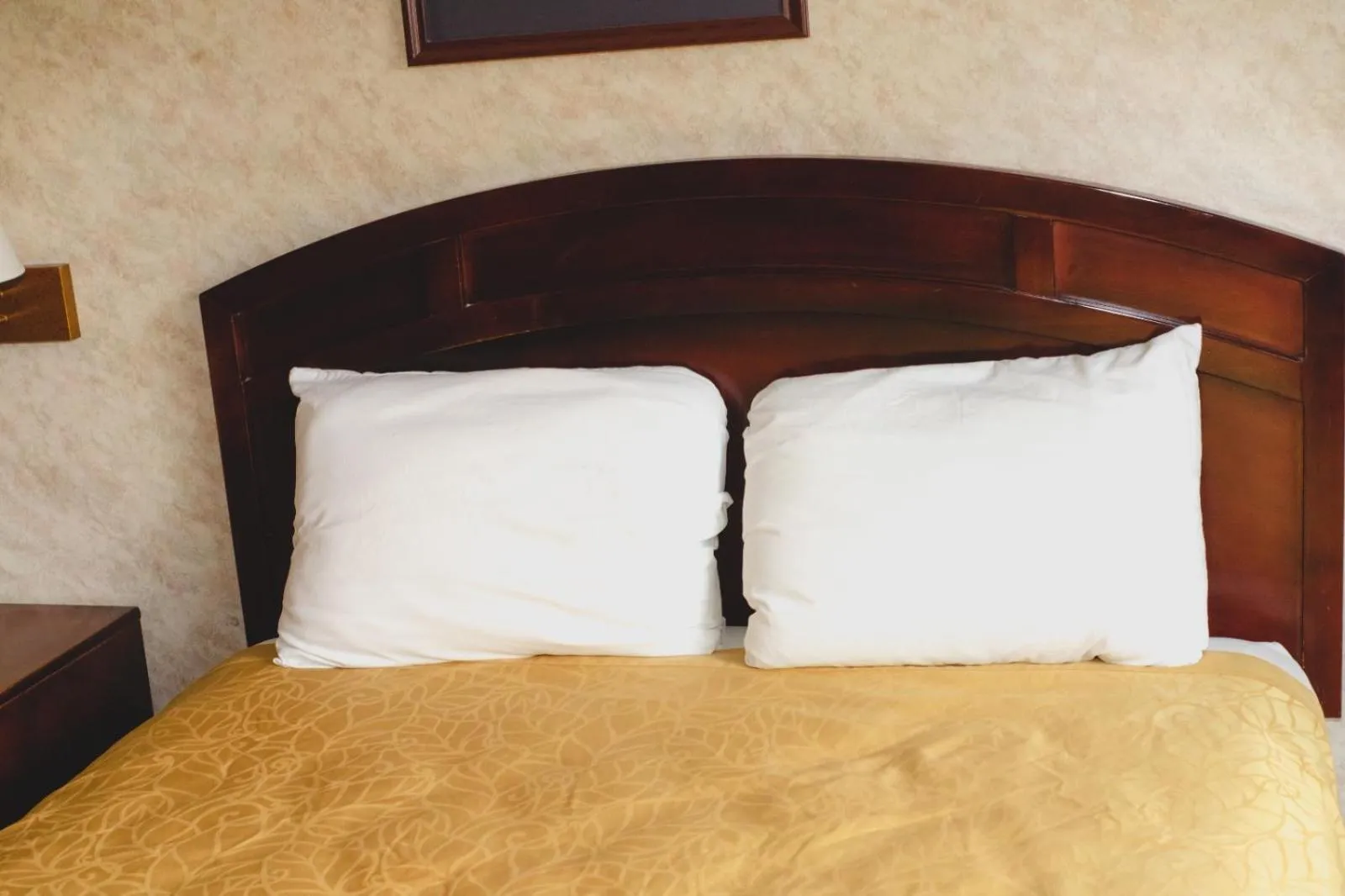 Bed in Colfax Inn By Marifah