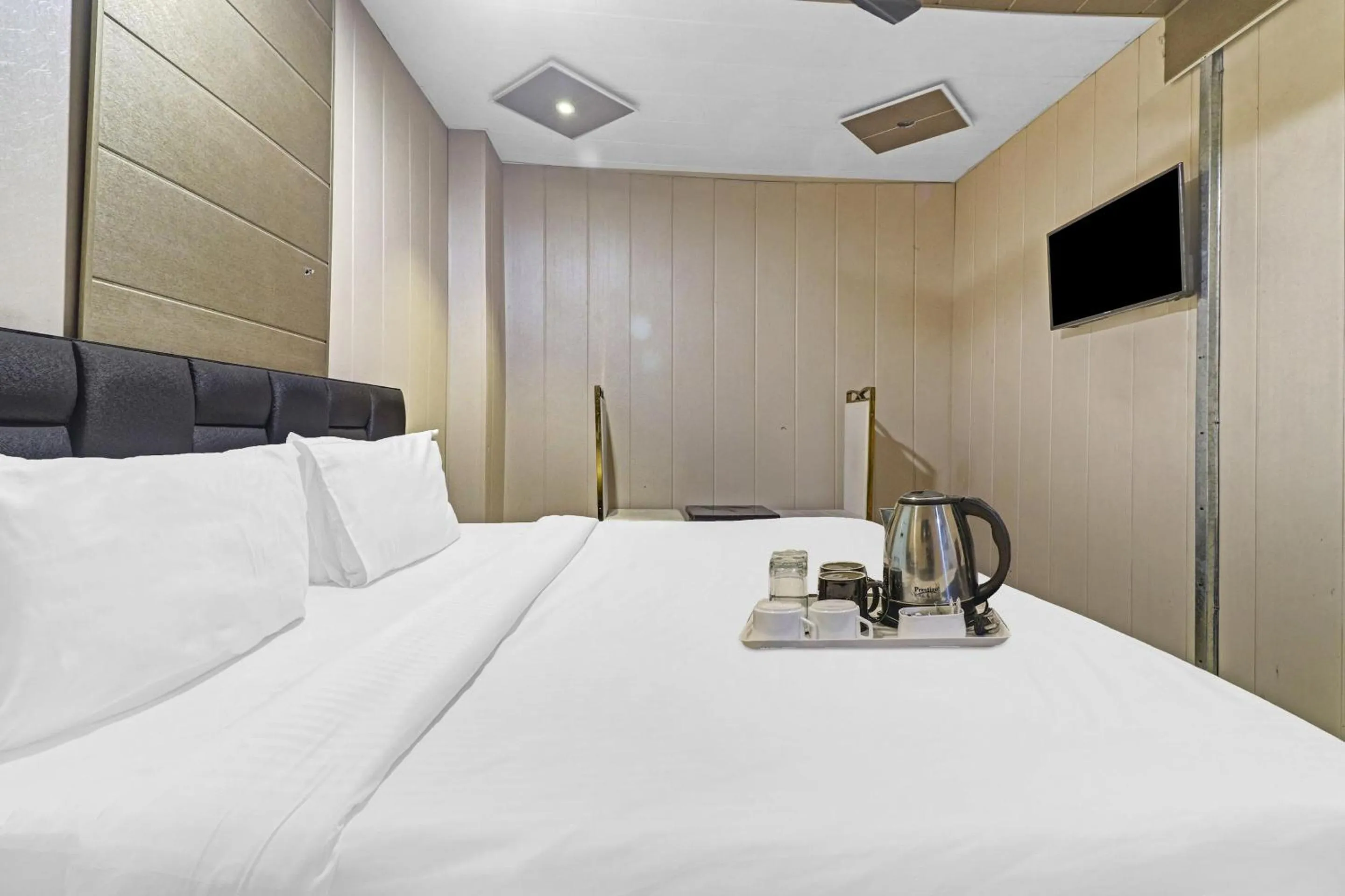 Bedroom, Bed in Townhouse Bhavya Residency