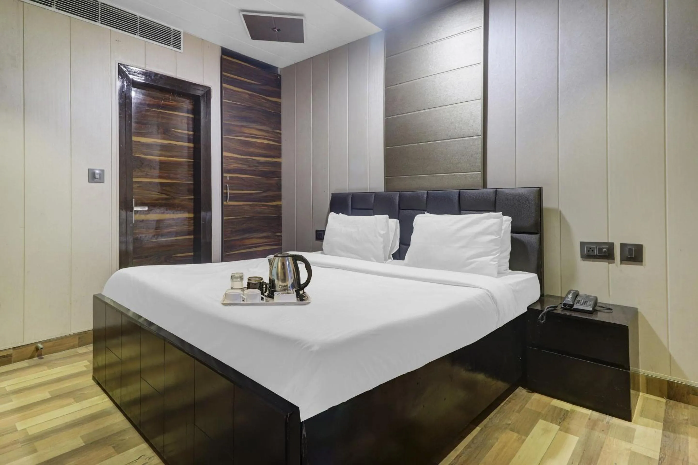 Bedroom, Bed in Townhouse Bhavya Residency