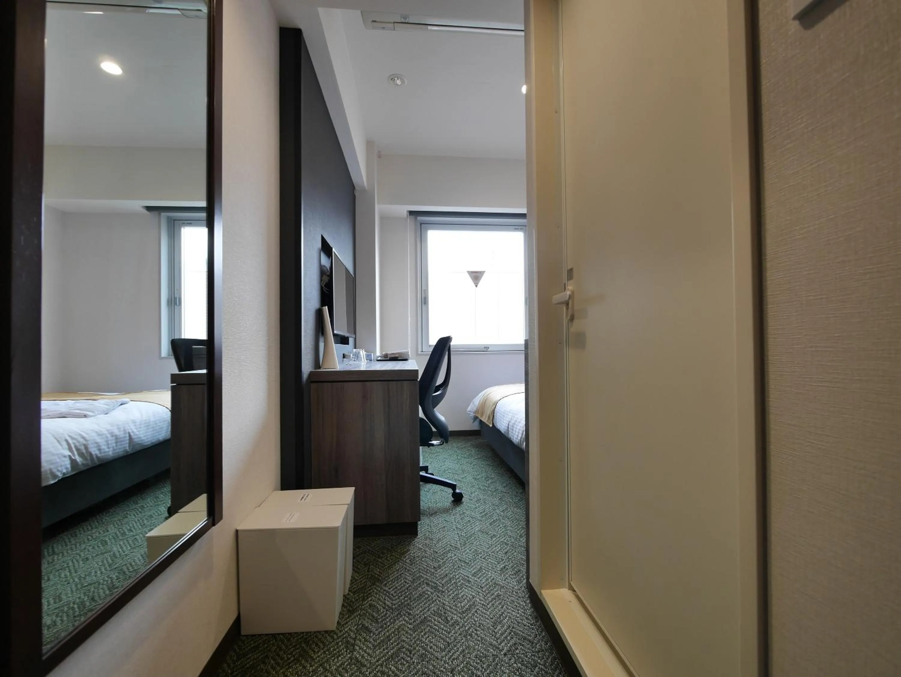 View (from property/room), Bed in Hotel Comfybed Ginza