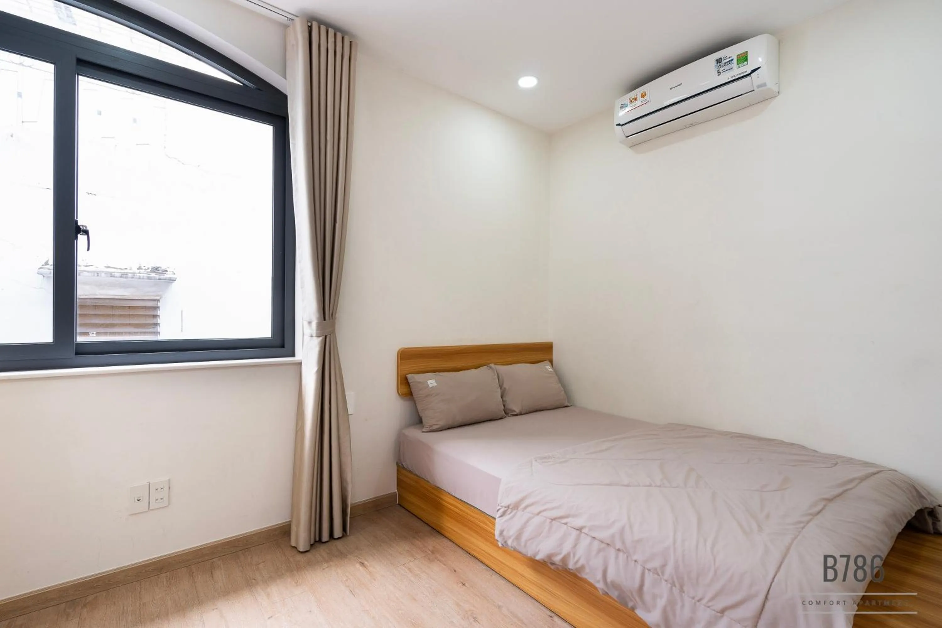 Bed in B786 Airport Apartment