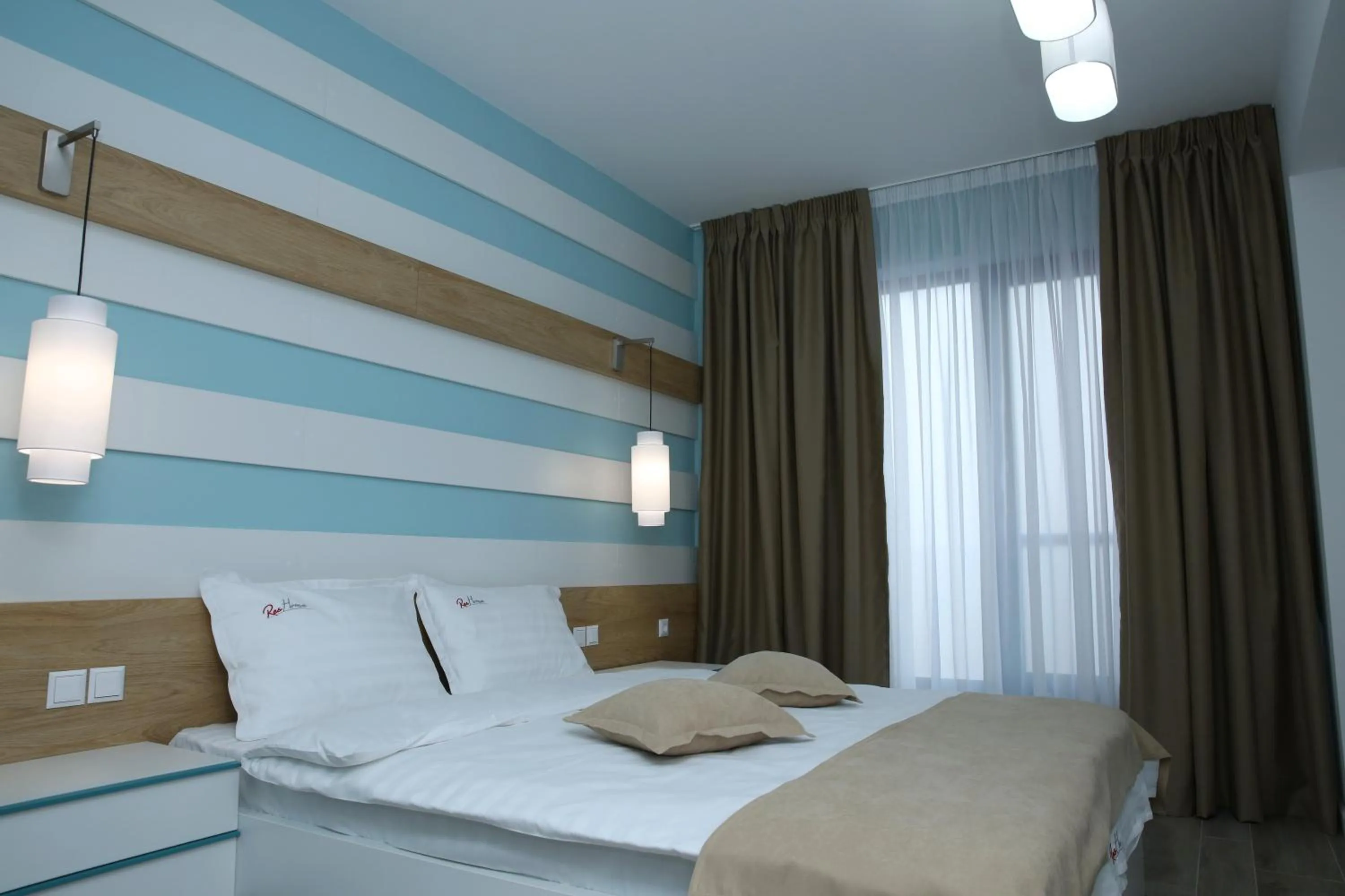 Bed in ResHome Apartments&Rooms