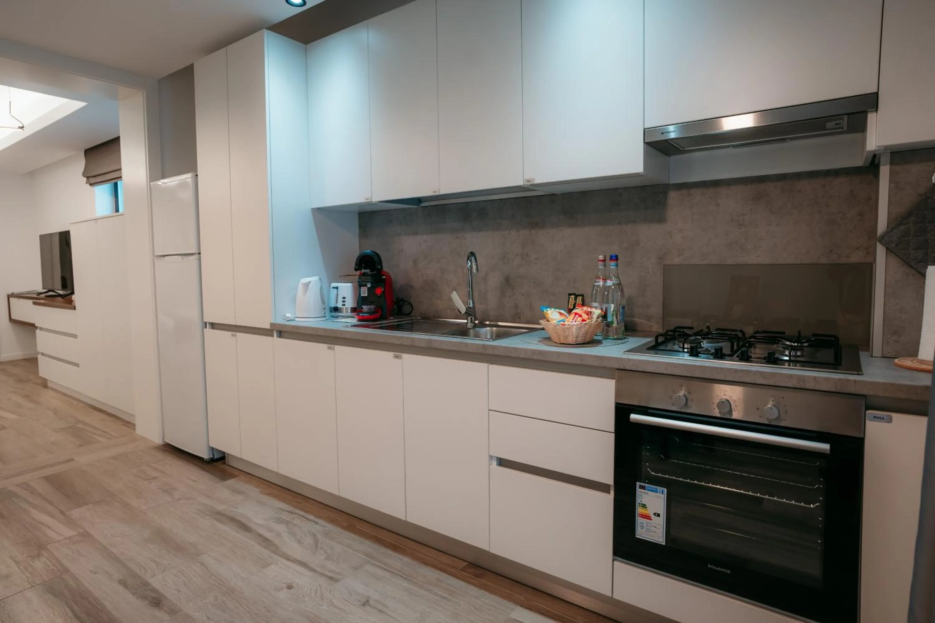 Kitchen or kitchenette in ResHome Apartments&Rooms