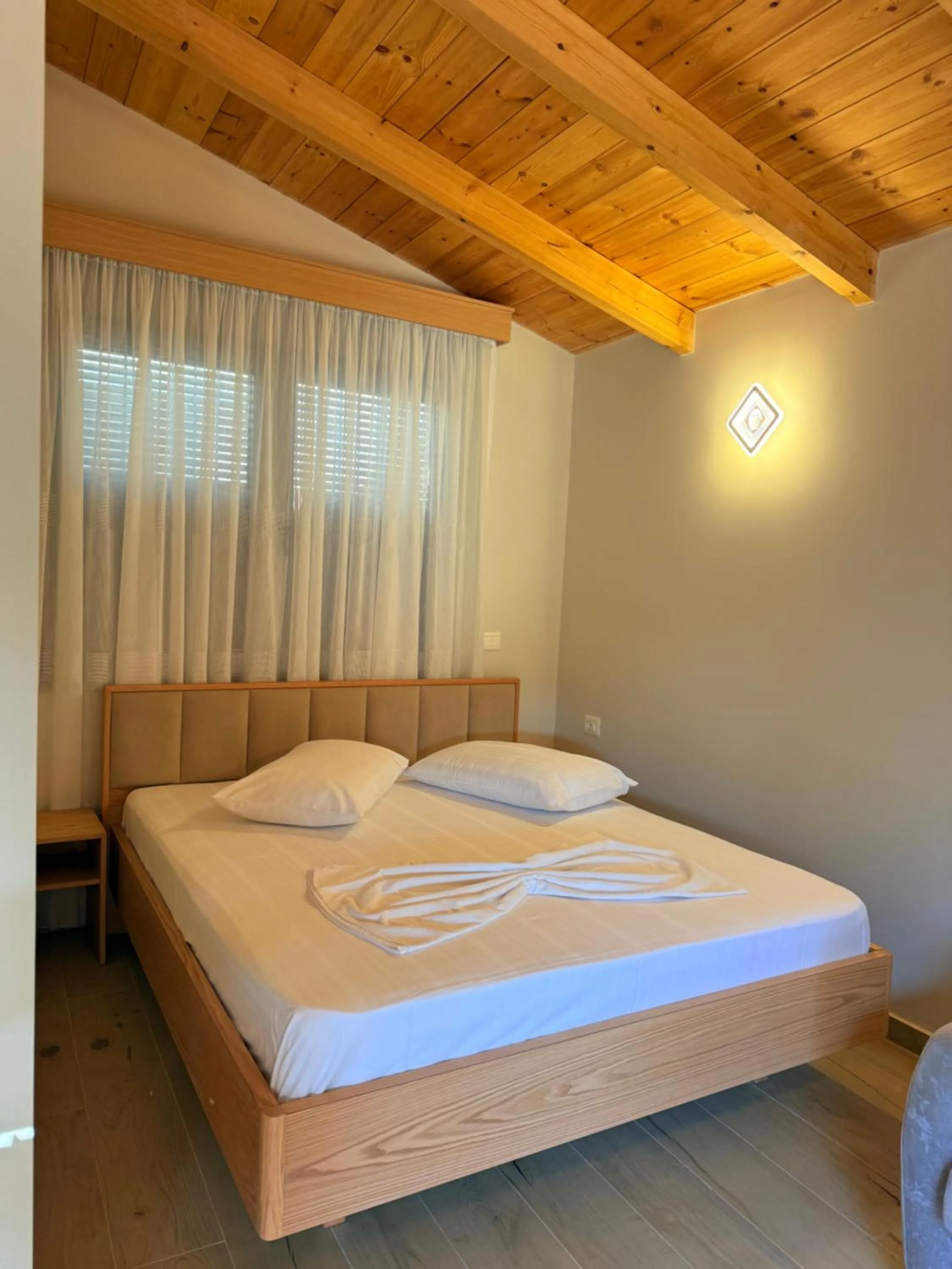 Bed in Arial Penthouse Suites