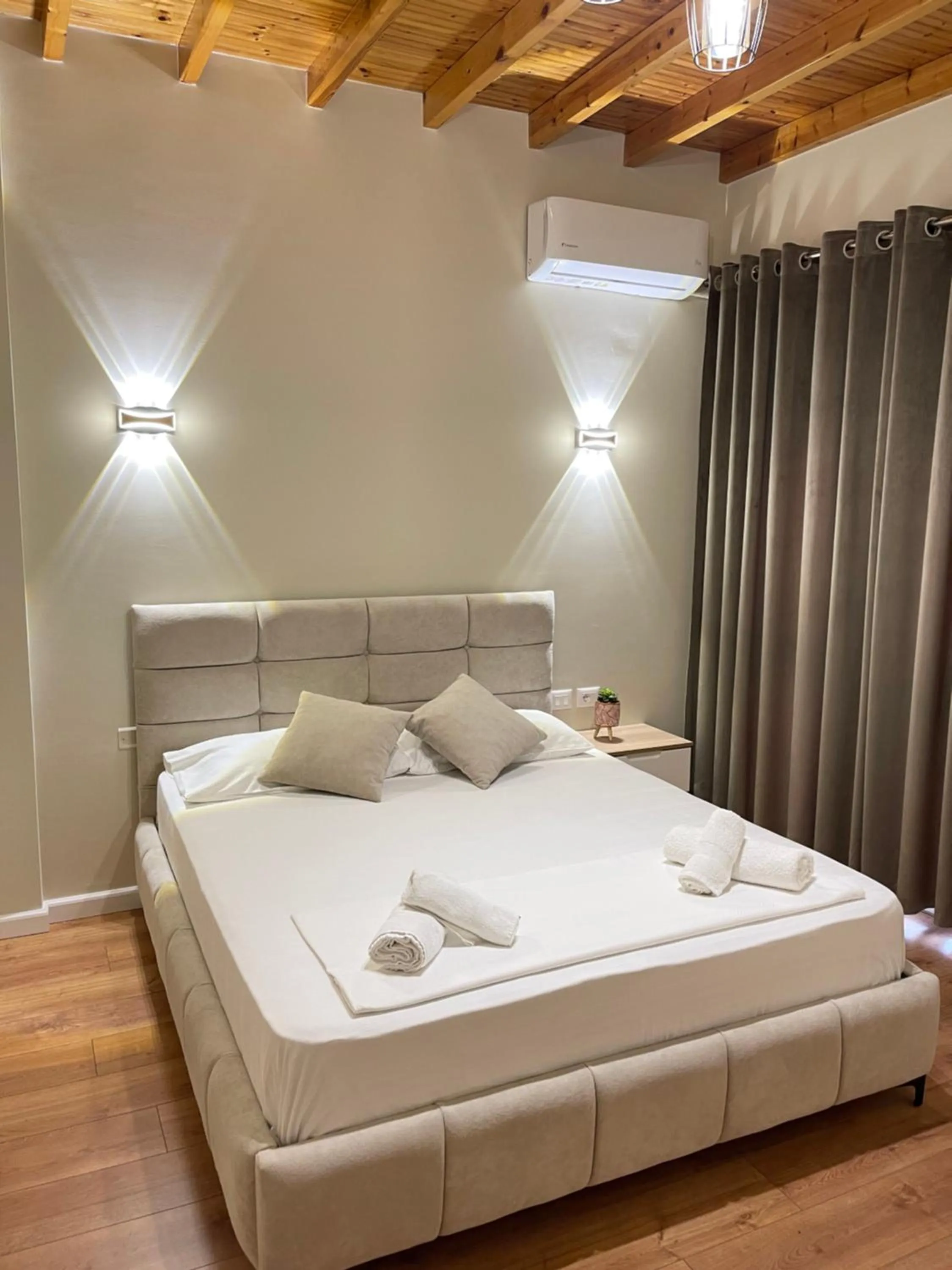 Bed in Arial Penthouse Suites