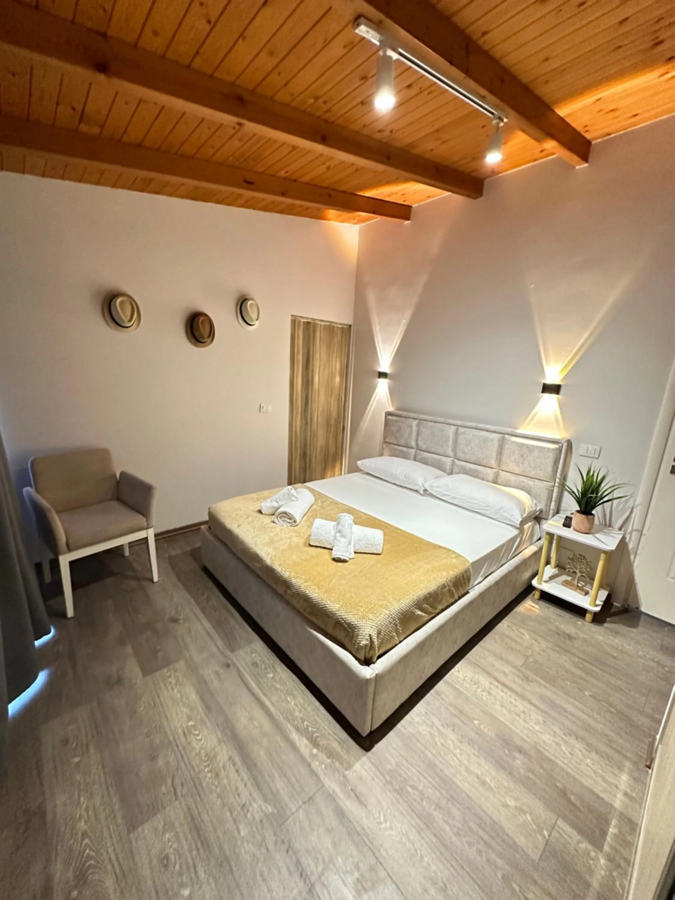 Bed in Arial Penthouse Suites